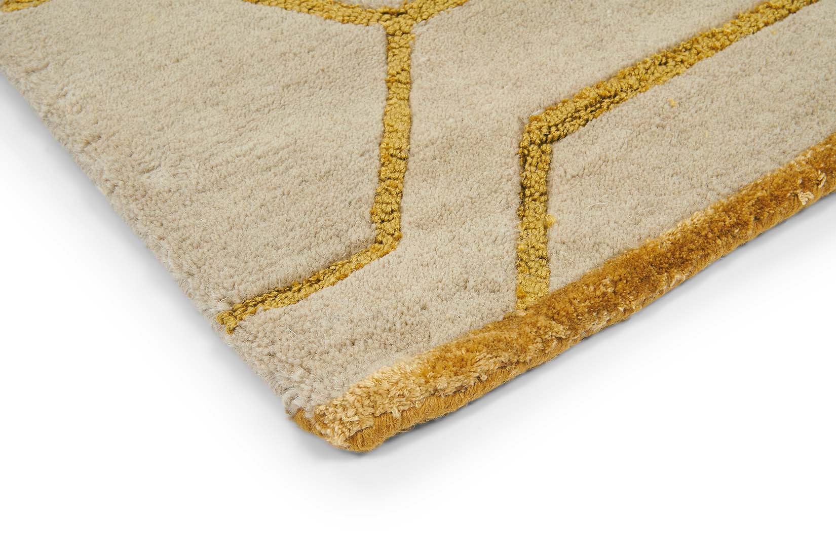 Rectangular grey rug with repeat gold hexagon pattern