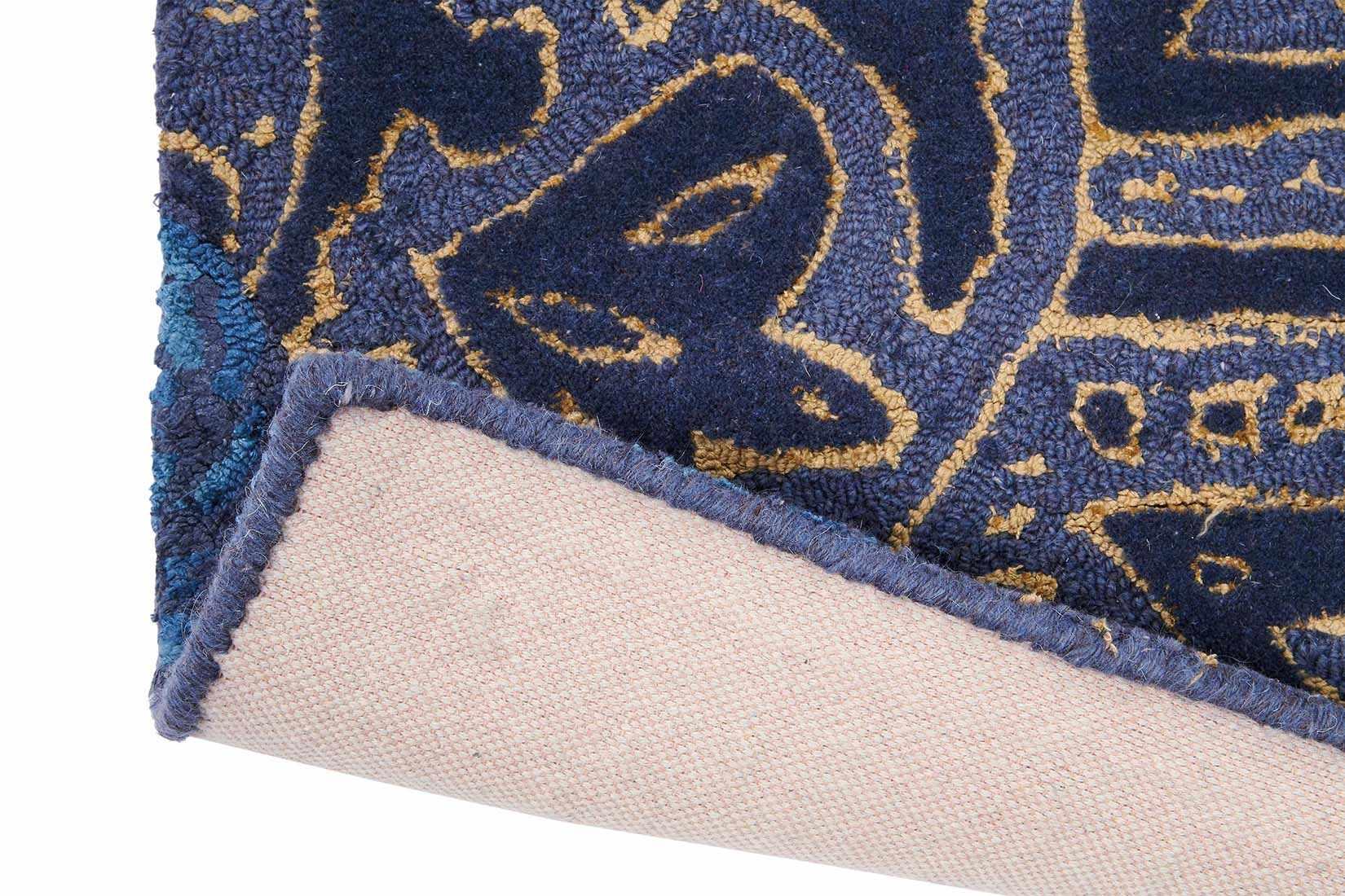 gold paisley pattern and engraved shapes