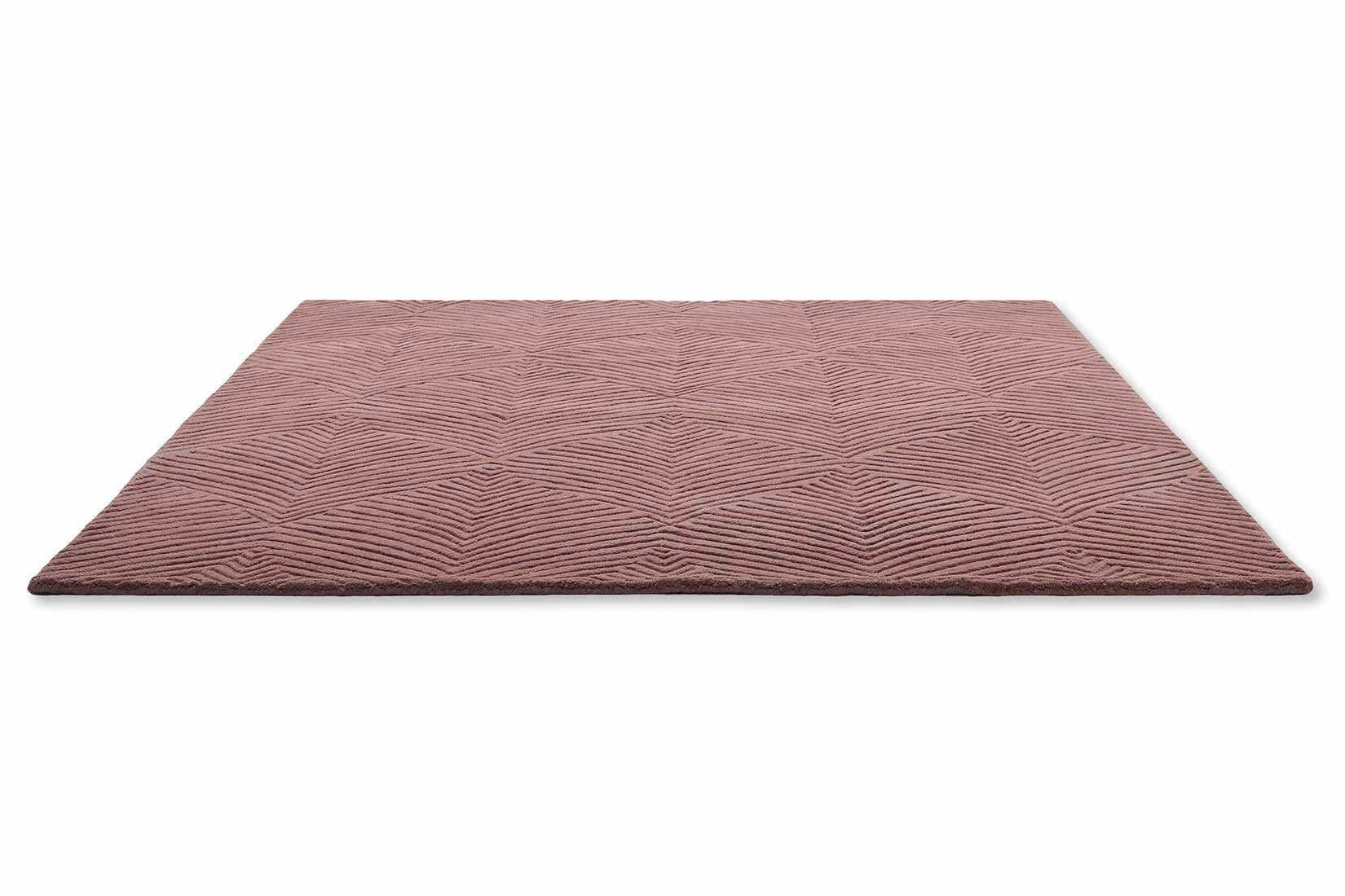 Rectangular mink rug with engraved leaf pattern