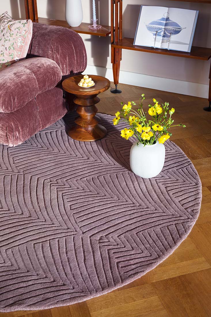 Rectangular mink rug with engraved leaf pattern