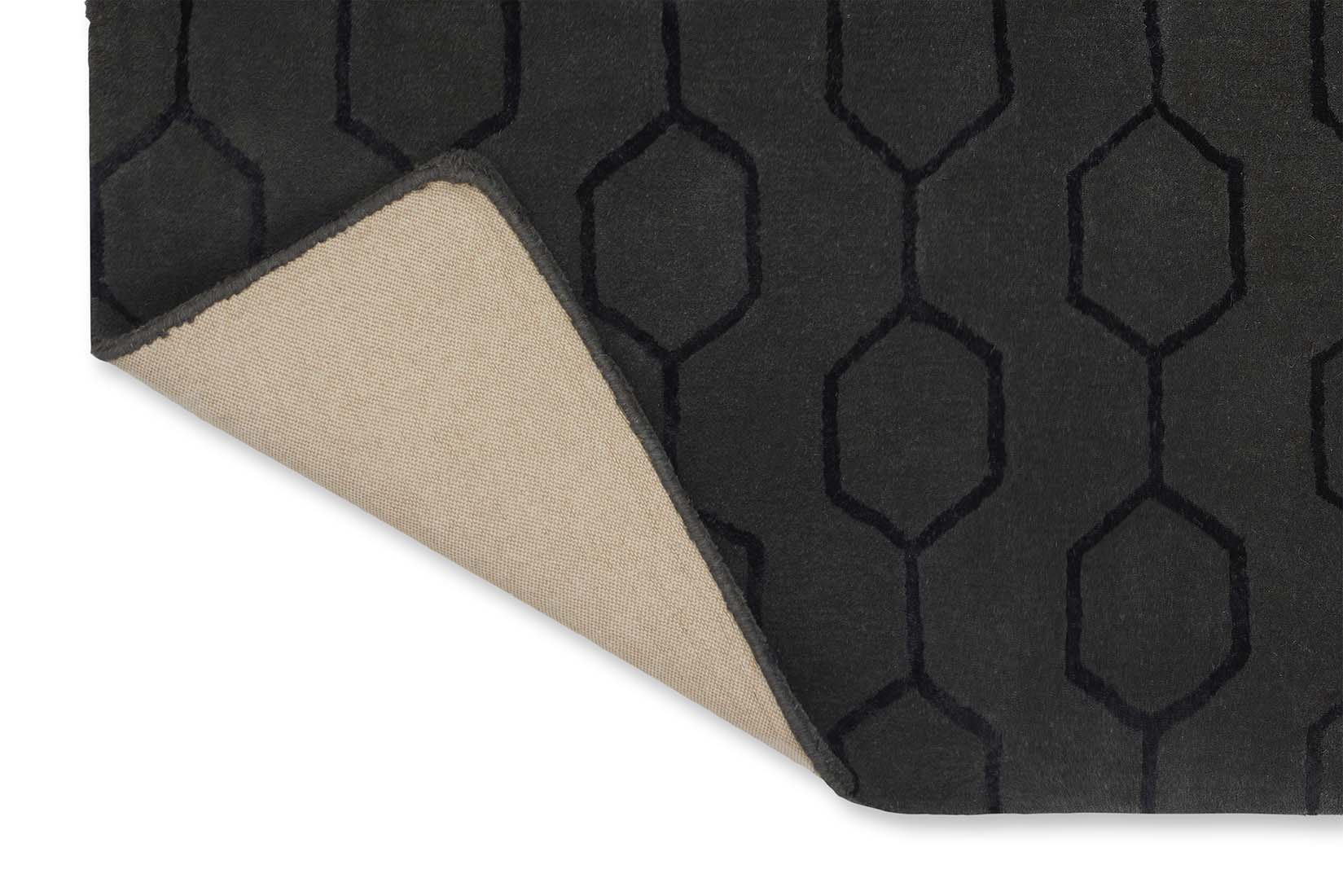 black geometric area rug