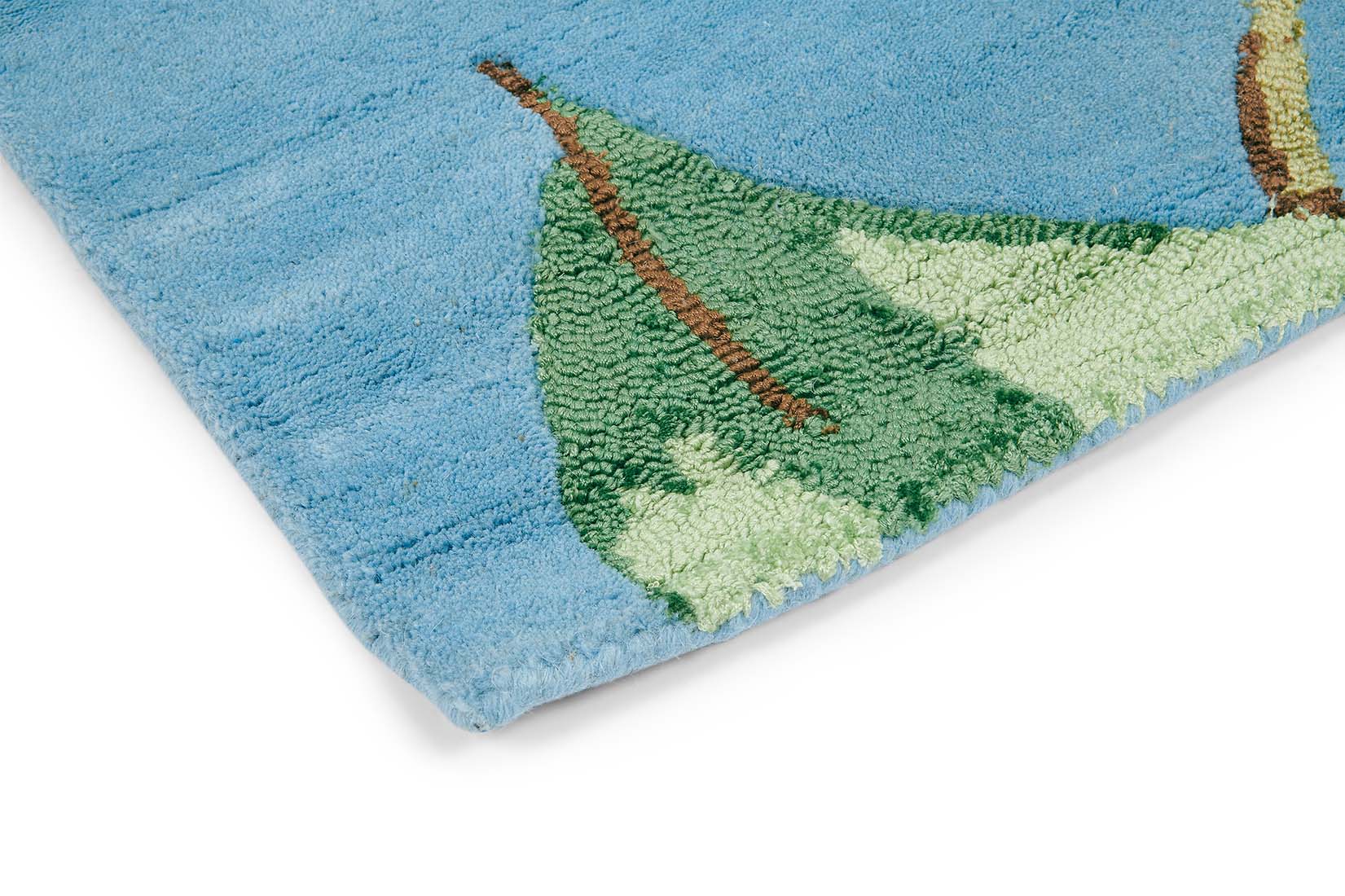 Rectangular blue rug decorated with flowers