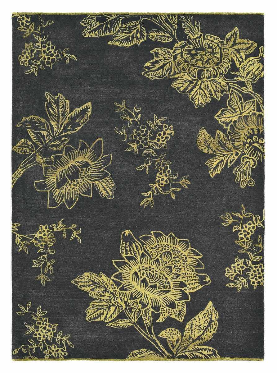 Rectangular black rug with gold floral design