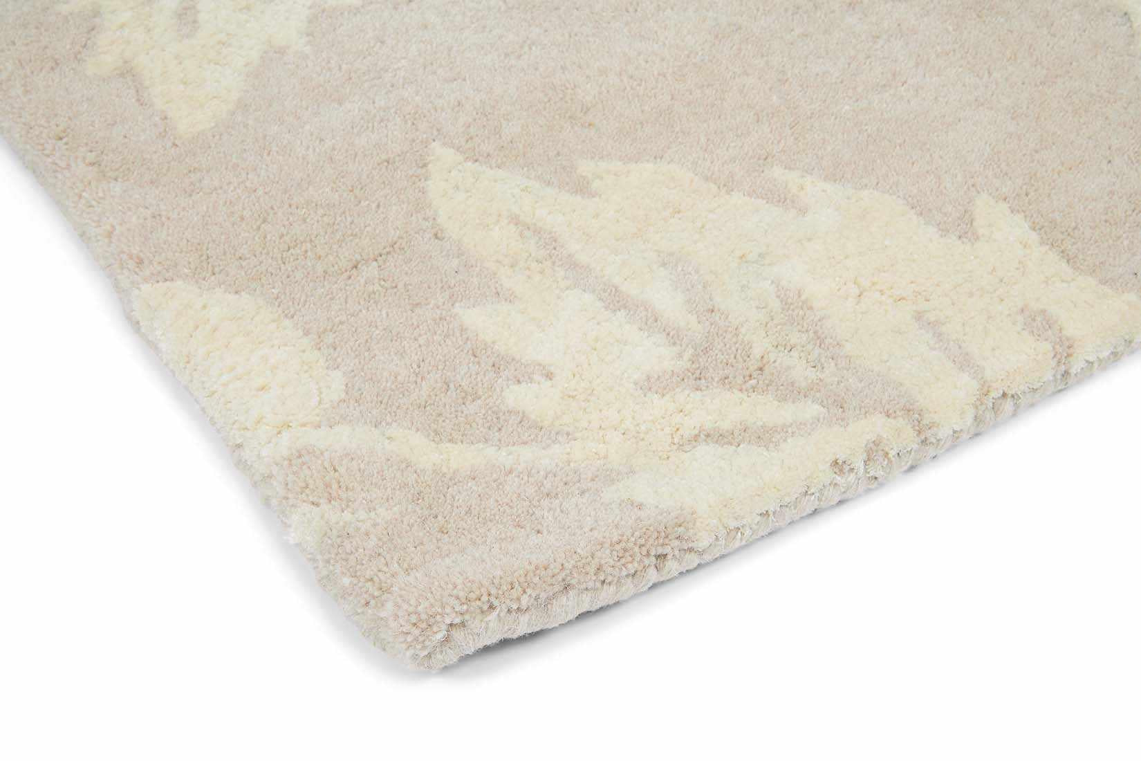 Rectangular taupe rug decorated with cream flowers