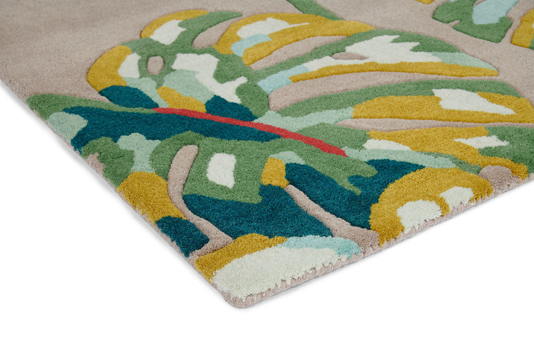 Harlequin rug with a multicolour leaf pattern