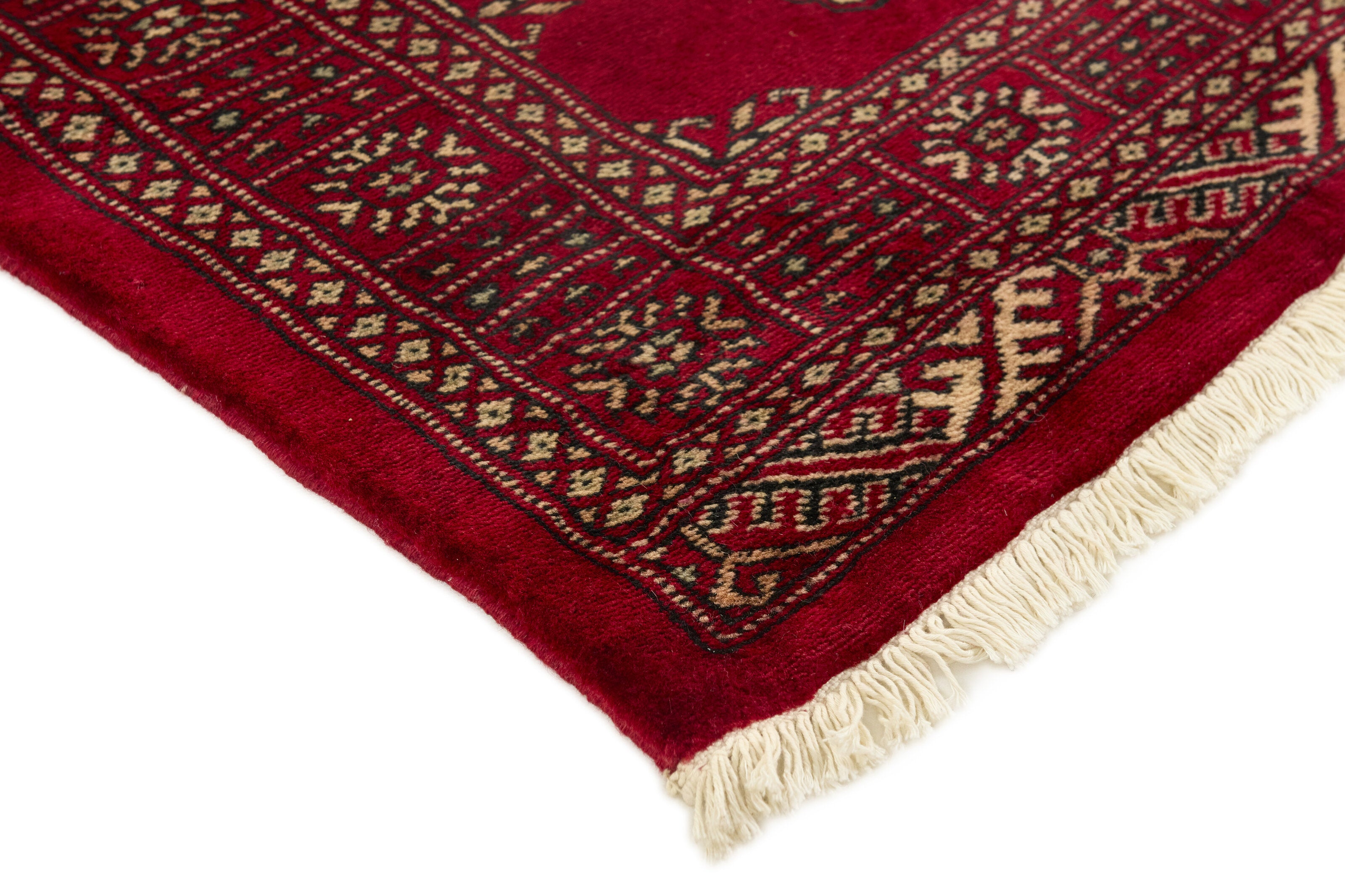 Red Oriental runner with traditional bordered pattern