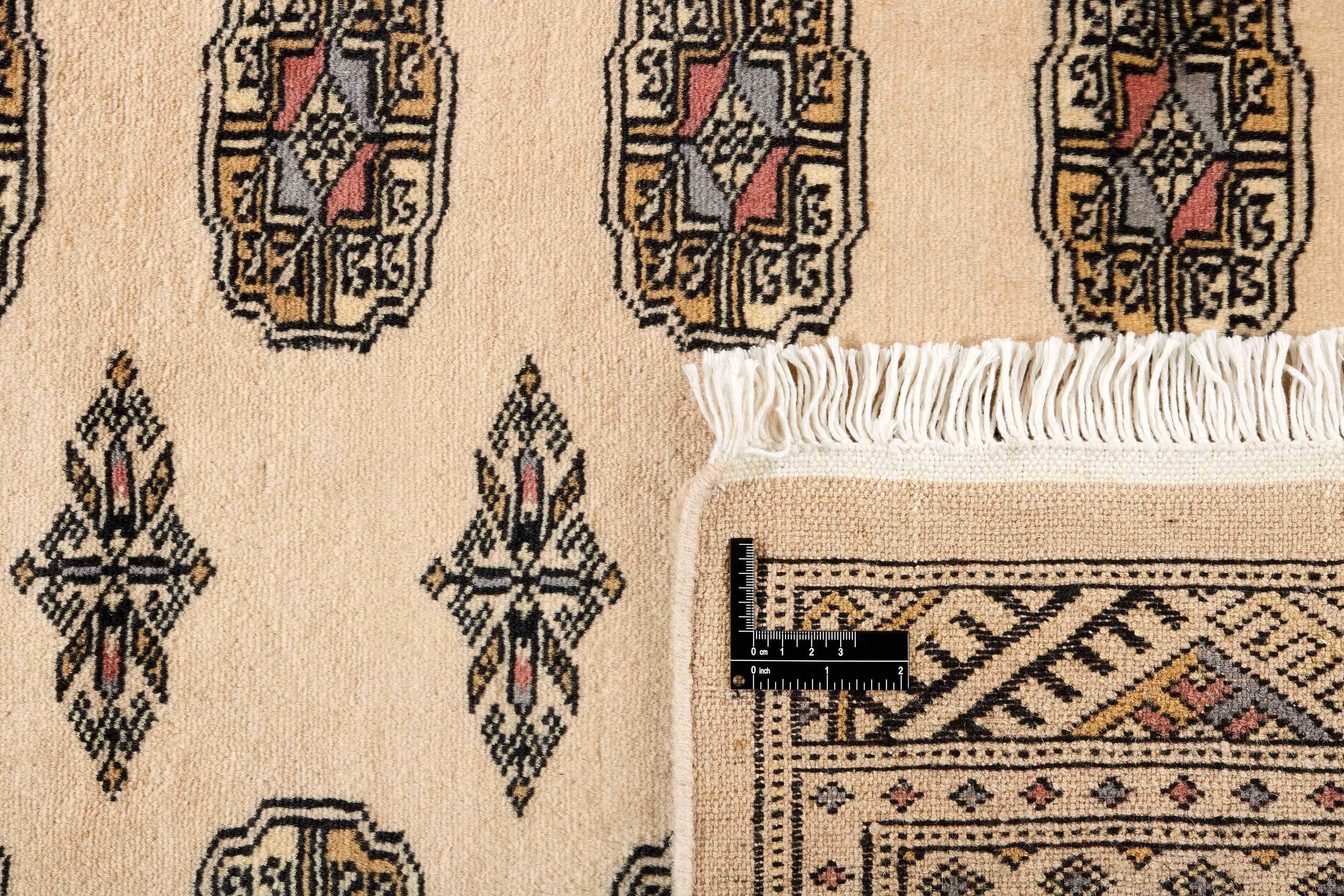 beige oriental rug with traditional pattern