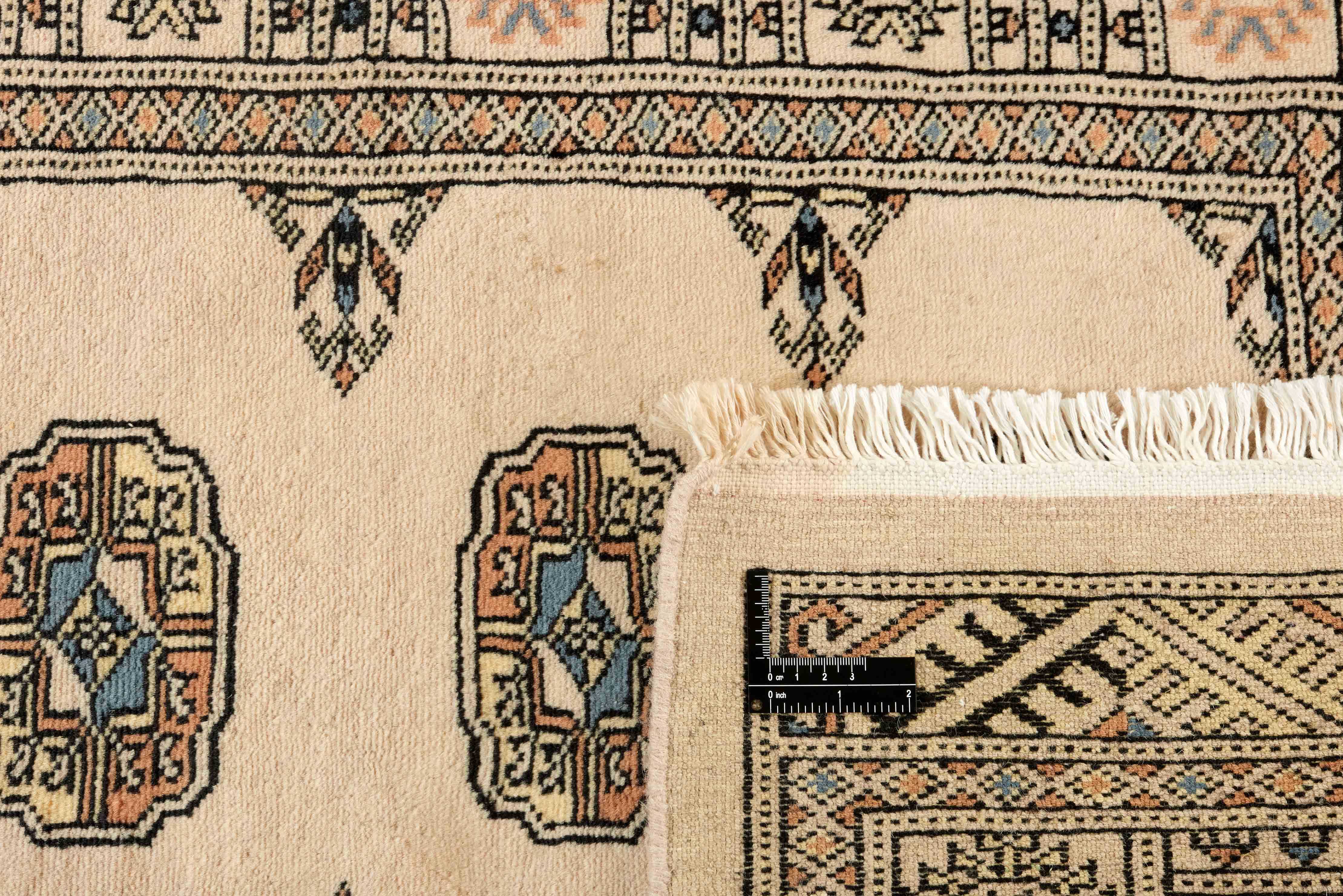 beige oriental runner with traditional gul pattern