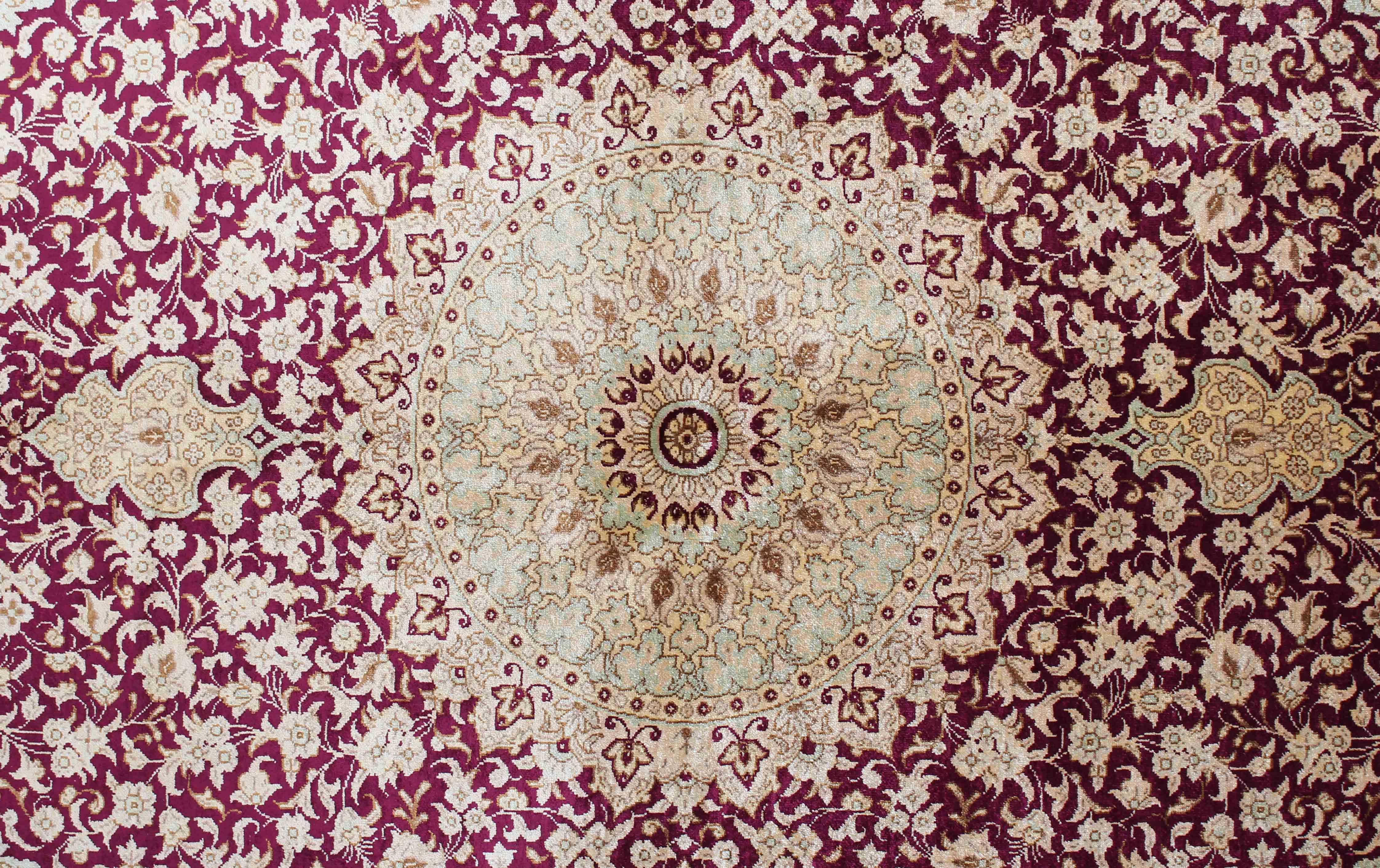 Authentic persian rug with a traditional design in red and beige