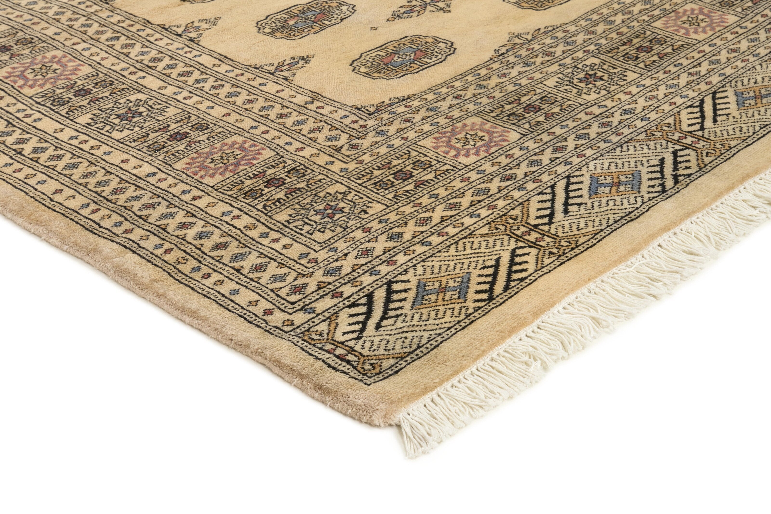 Beige Oriental rug with traditional bordered pattern