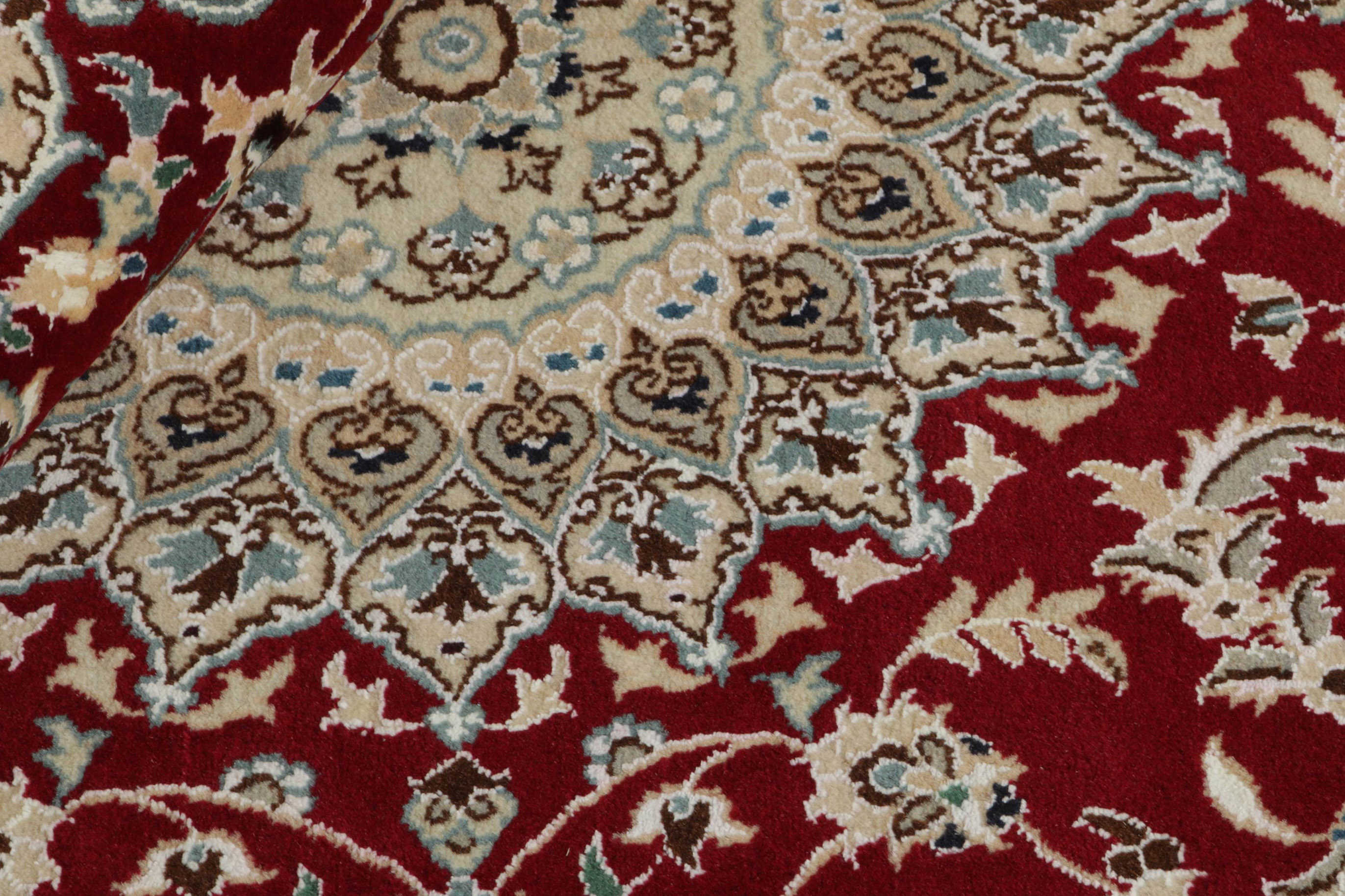 Authentic oriental rug with traditional floral design in red