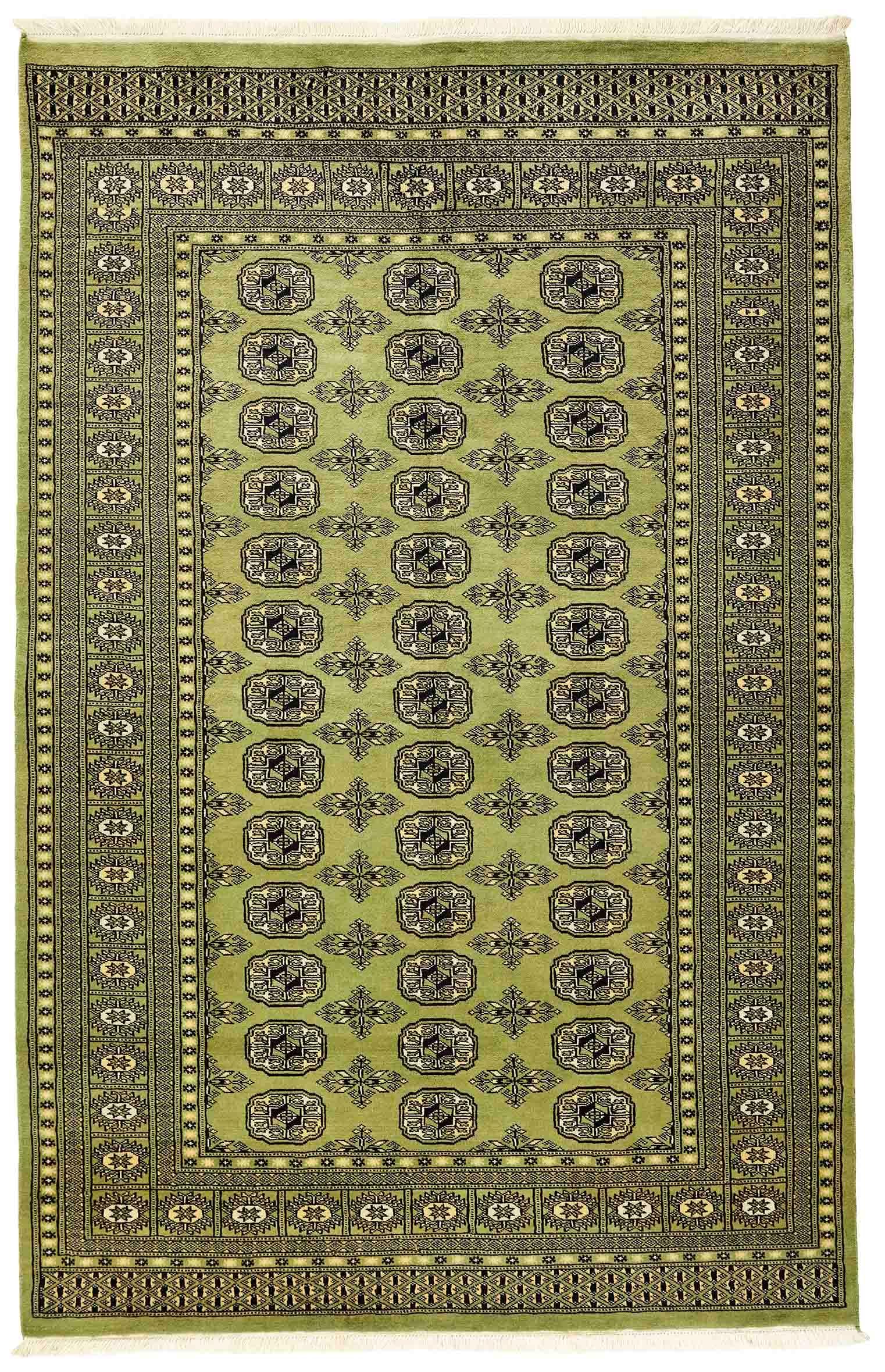 green oriental rug with traditional pattern