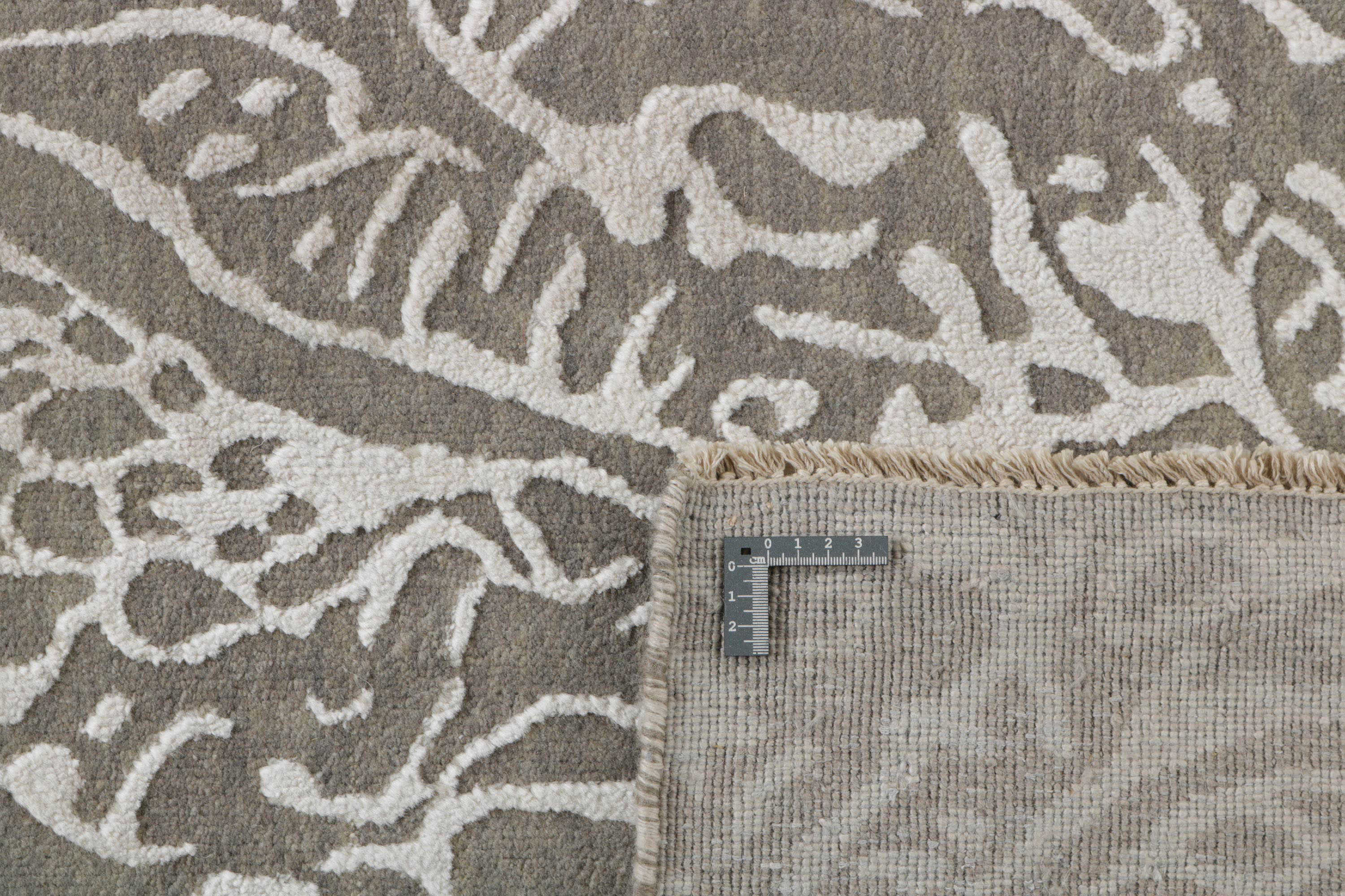 Authentic oriental rug with a damask pattern in beige