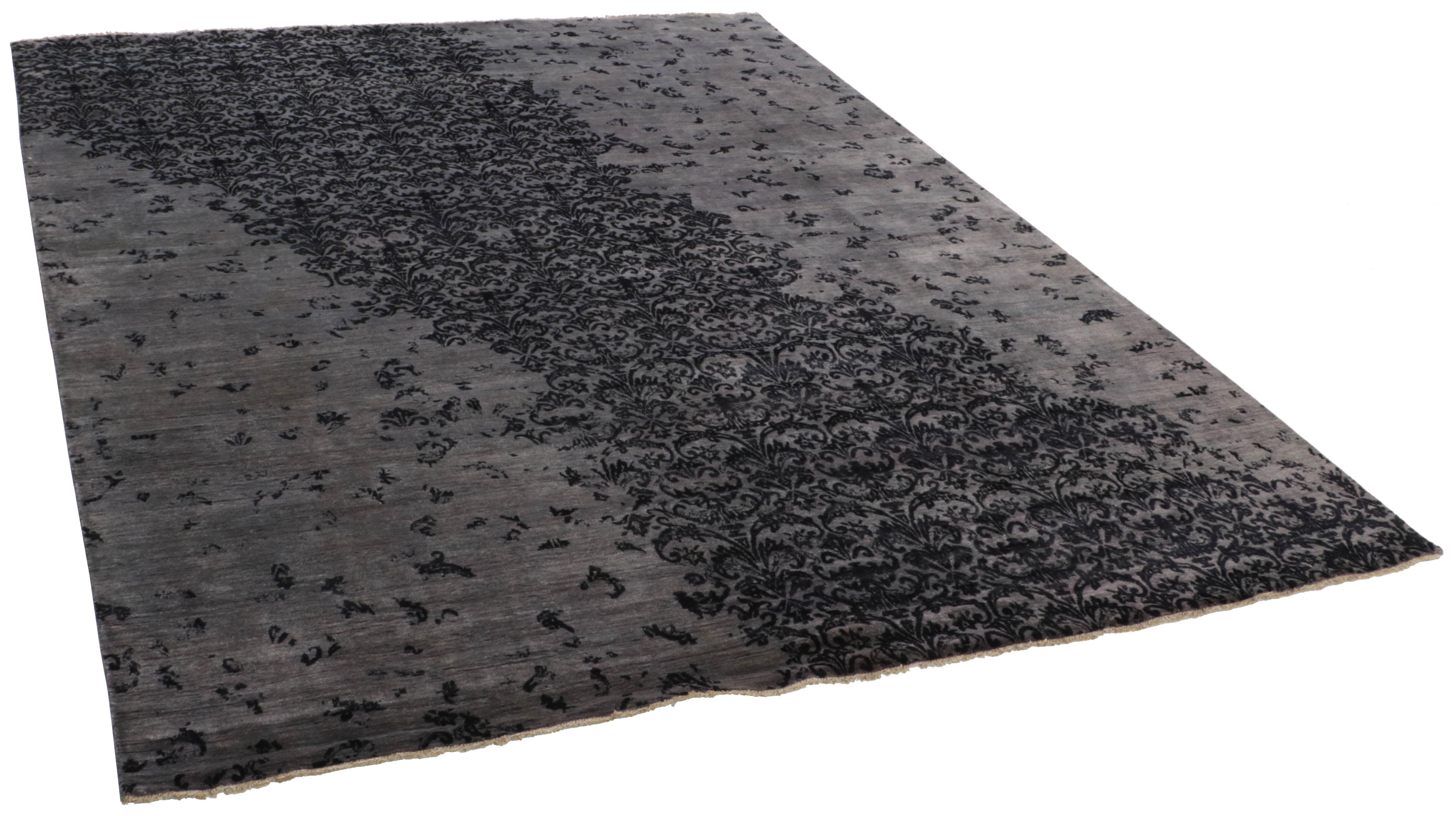Authentic oriental rug with a damask pattern in grey