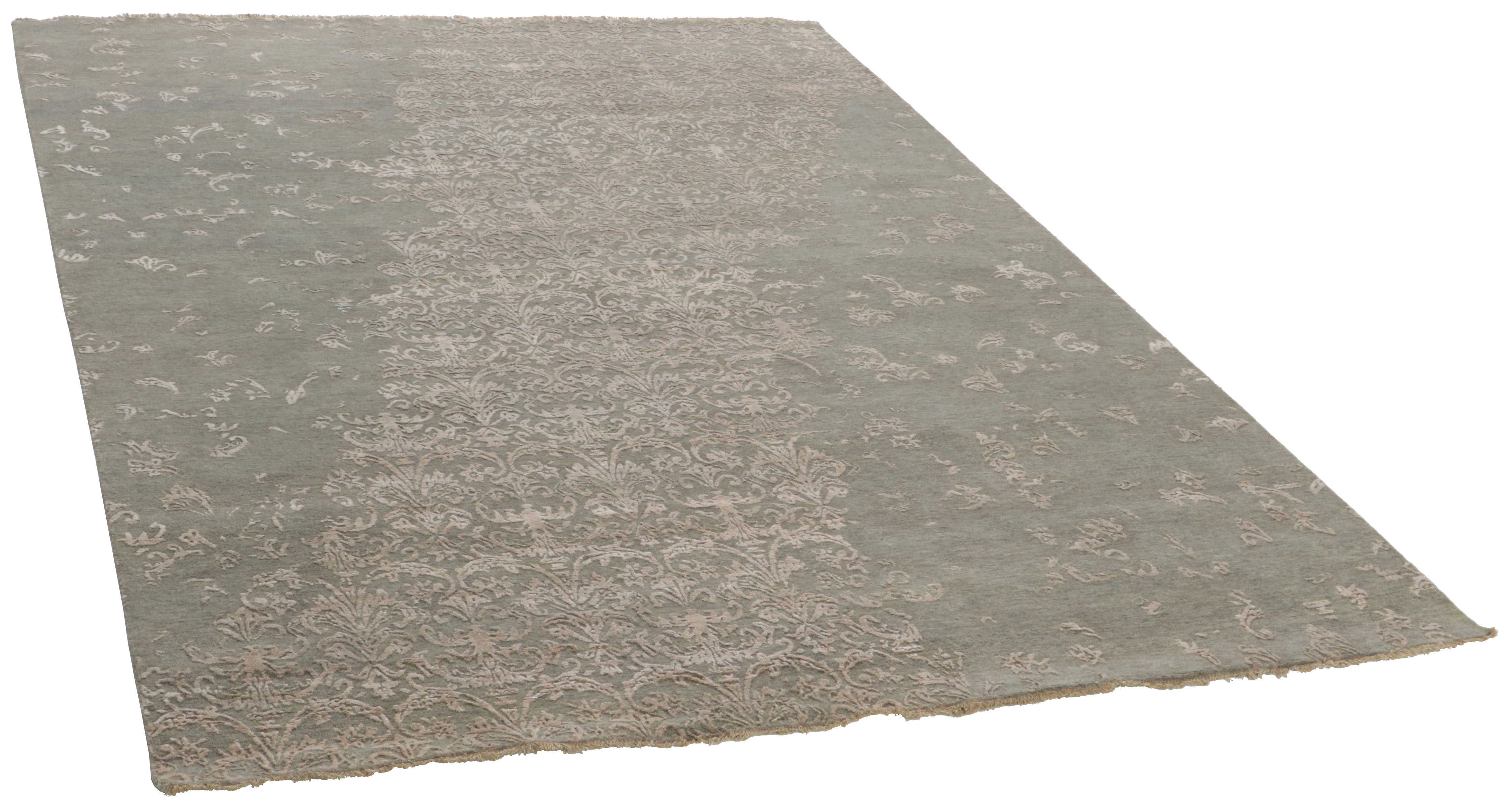 Authentic oriental rug with a damask pattern in green
