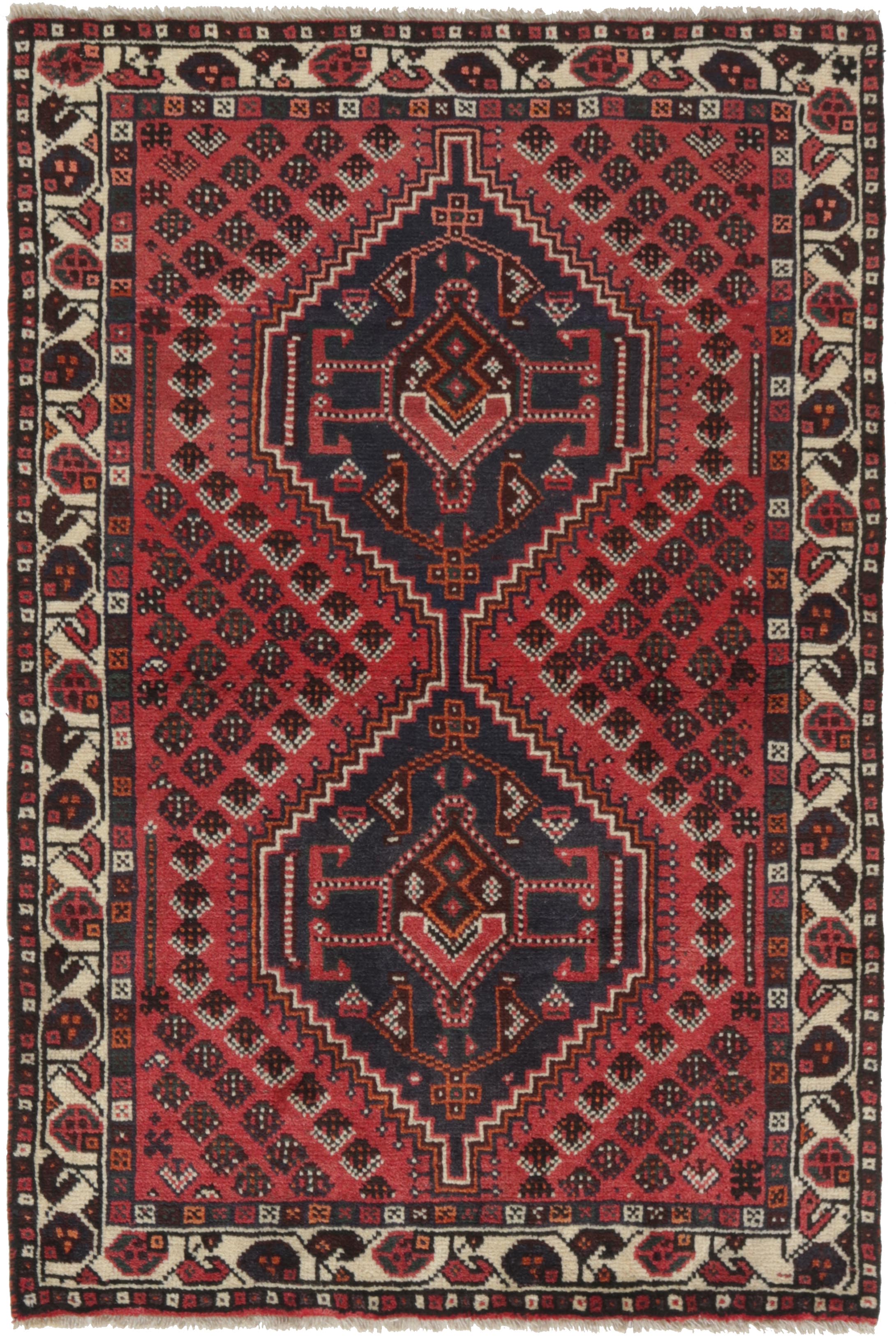 Authentic persian rug with a traditional tribal geometric pattern in red, black and white