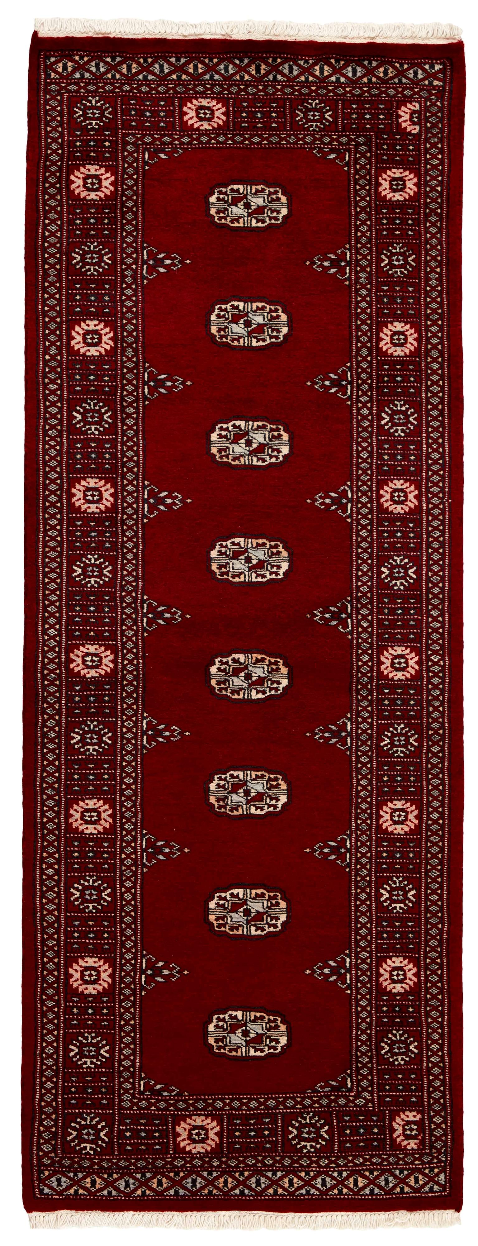 red oriental runner with traditional gul pattern