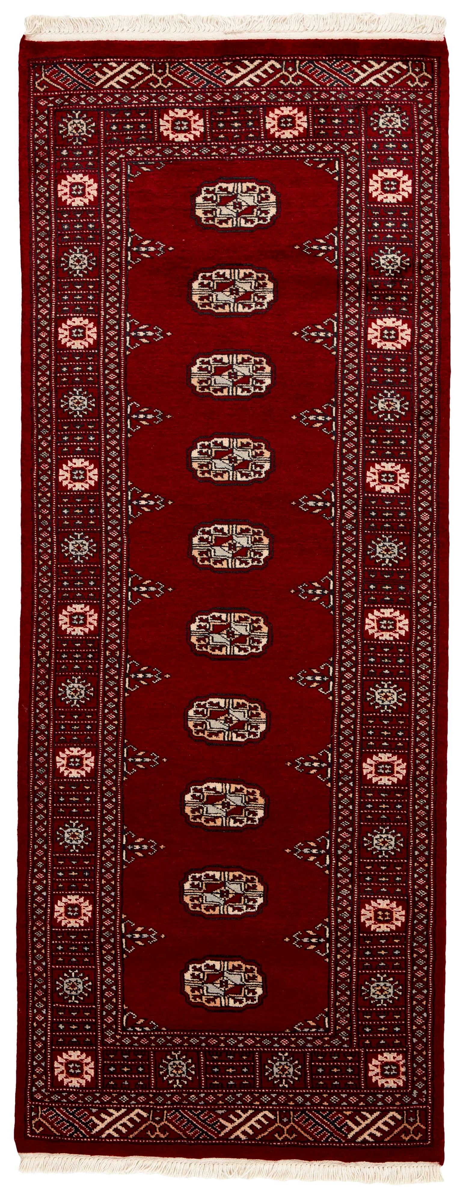 red oriental runner with traditional gul pattern