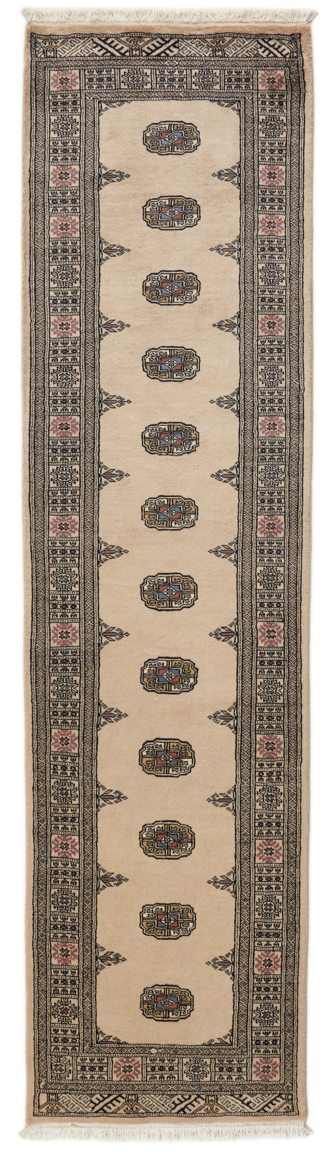 Beige Oriental runner with traditional bordered pattern