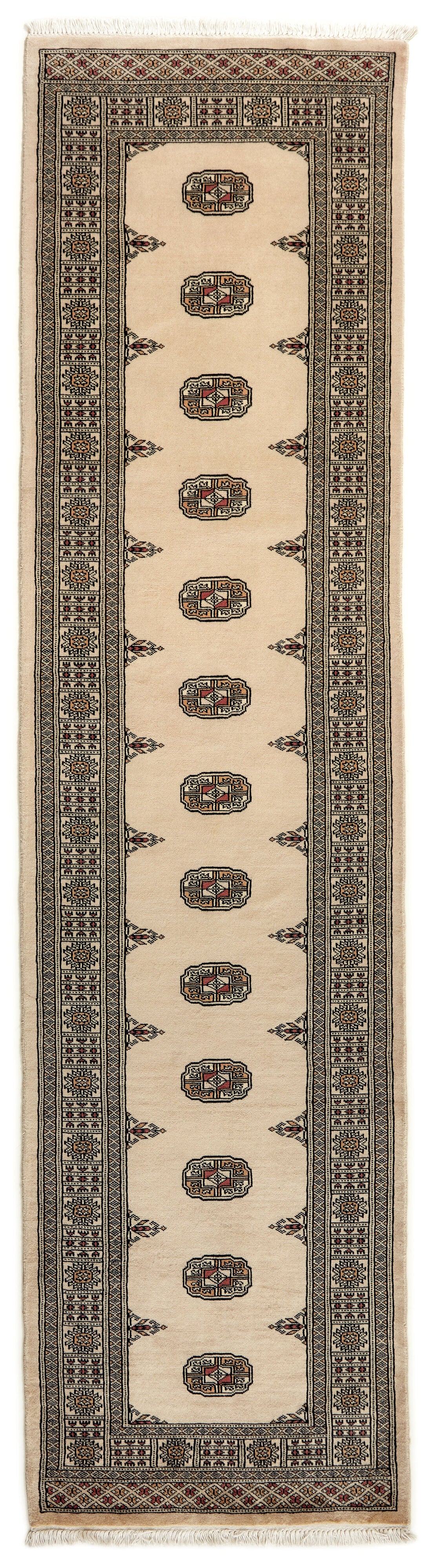 Beige Oriental runner with traditional bordered pattern