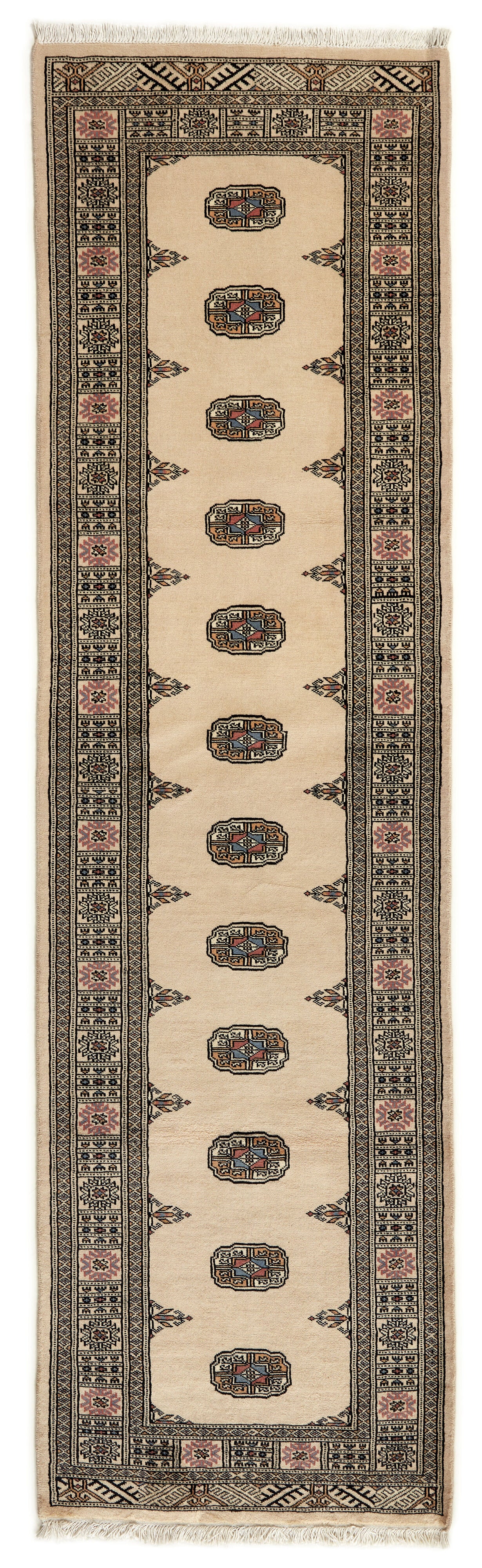 Beige Oriental runner with traditional bordered pattern