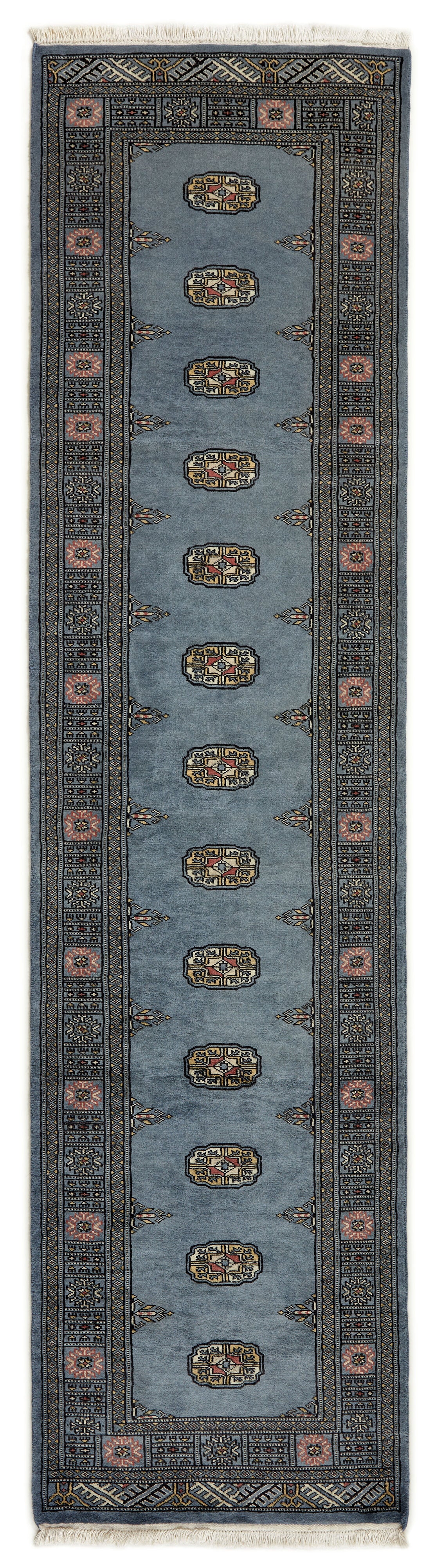 Blue Oriental runner with traditional bordered pattern