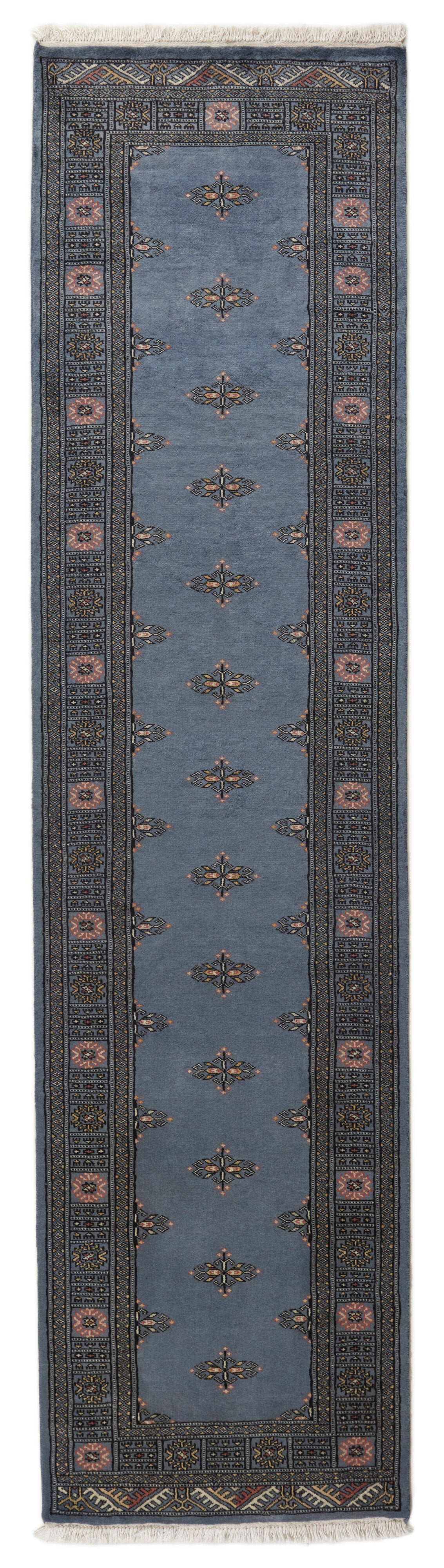 Blue Oriental runner with traditional bordered pattern