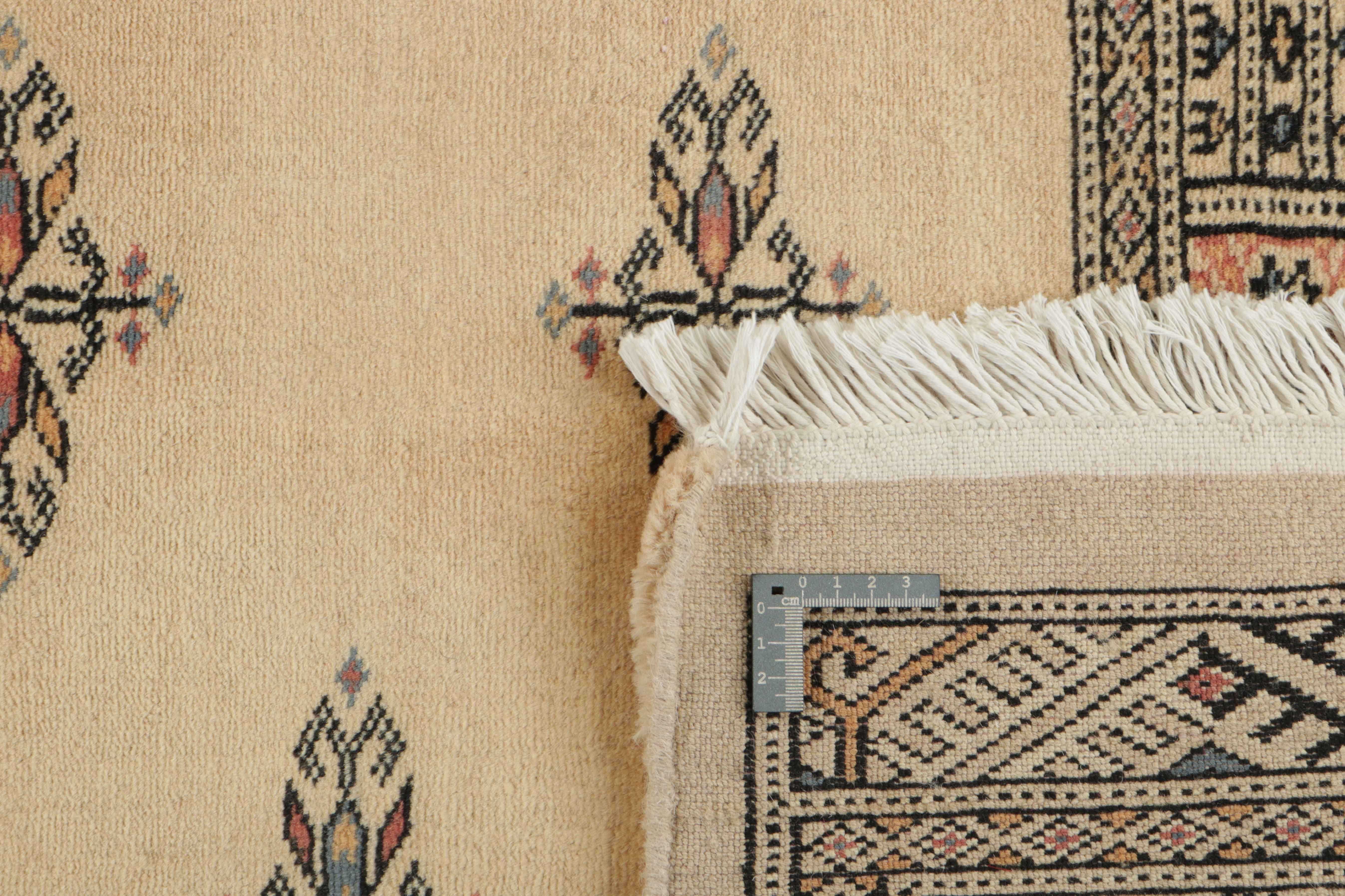 beige oriental runner with traditional gul pattern