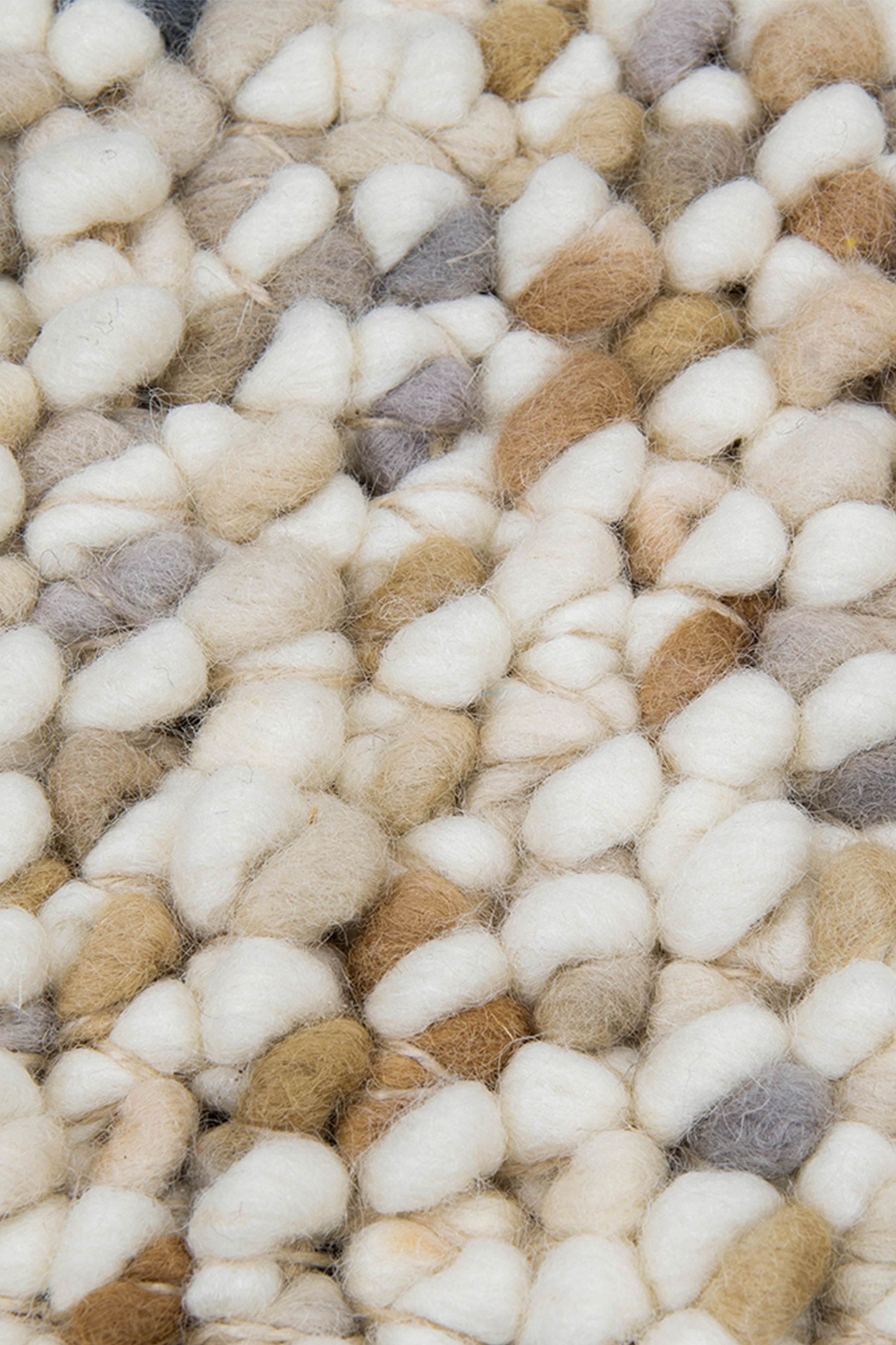 cream, tan and grey textured area rug