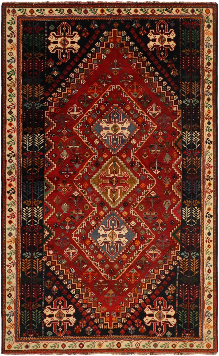 red, black, cream and blue persian rug with geometric design

