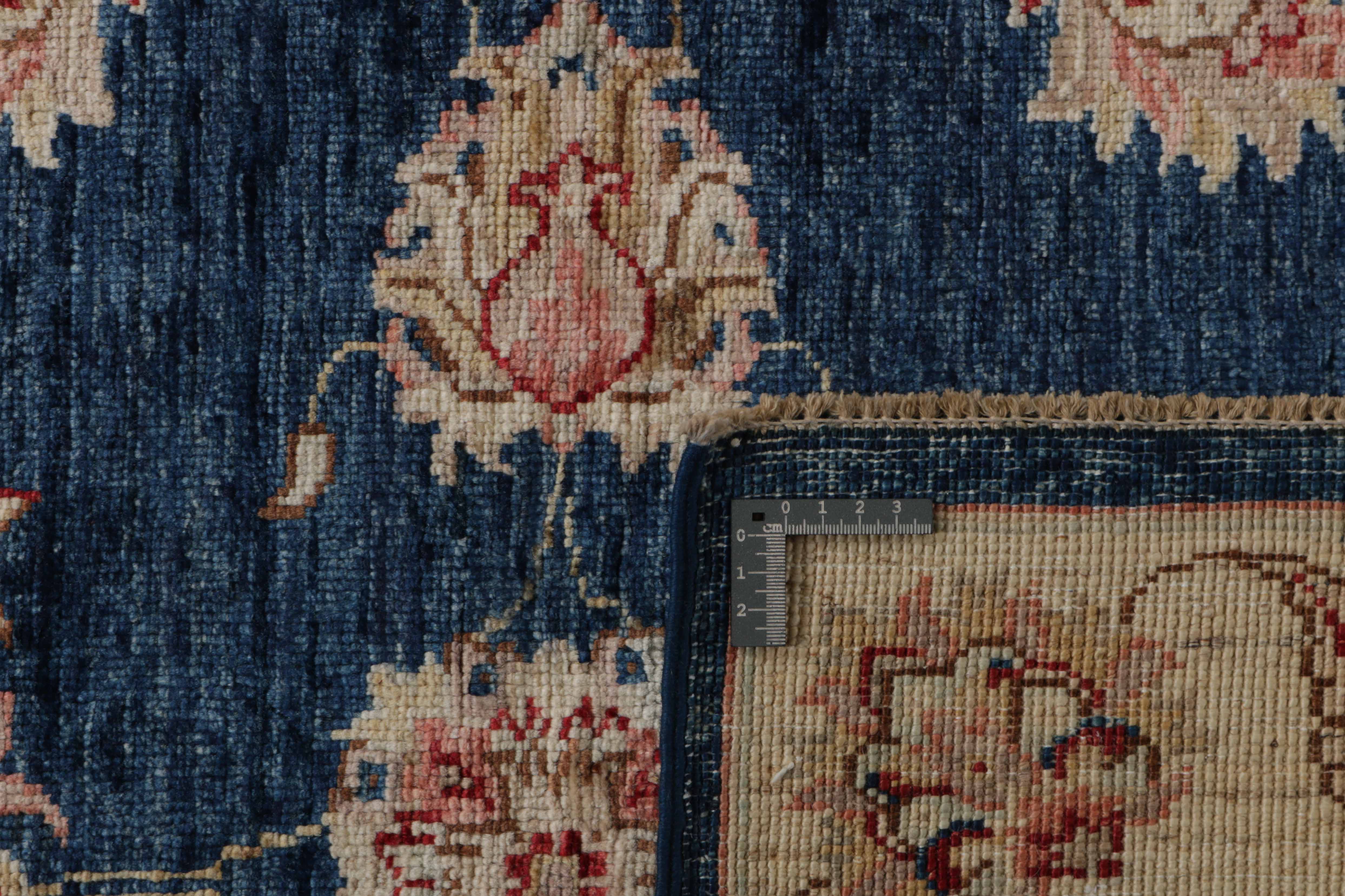 oriental rug with blue and beige floral pattern
