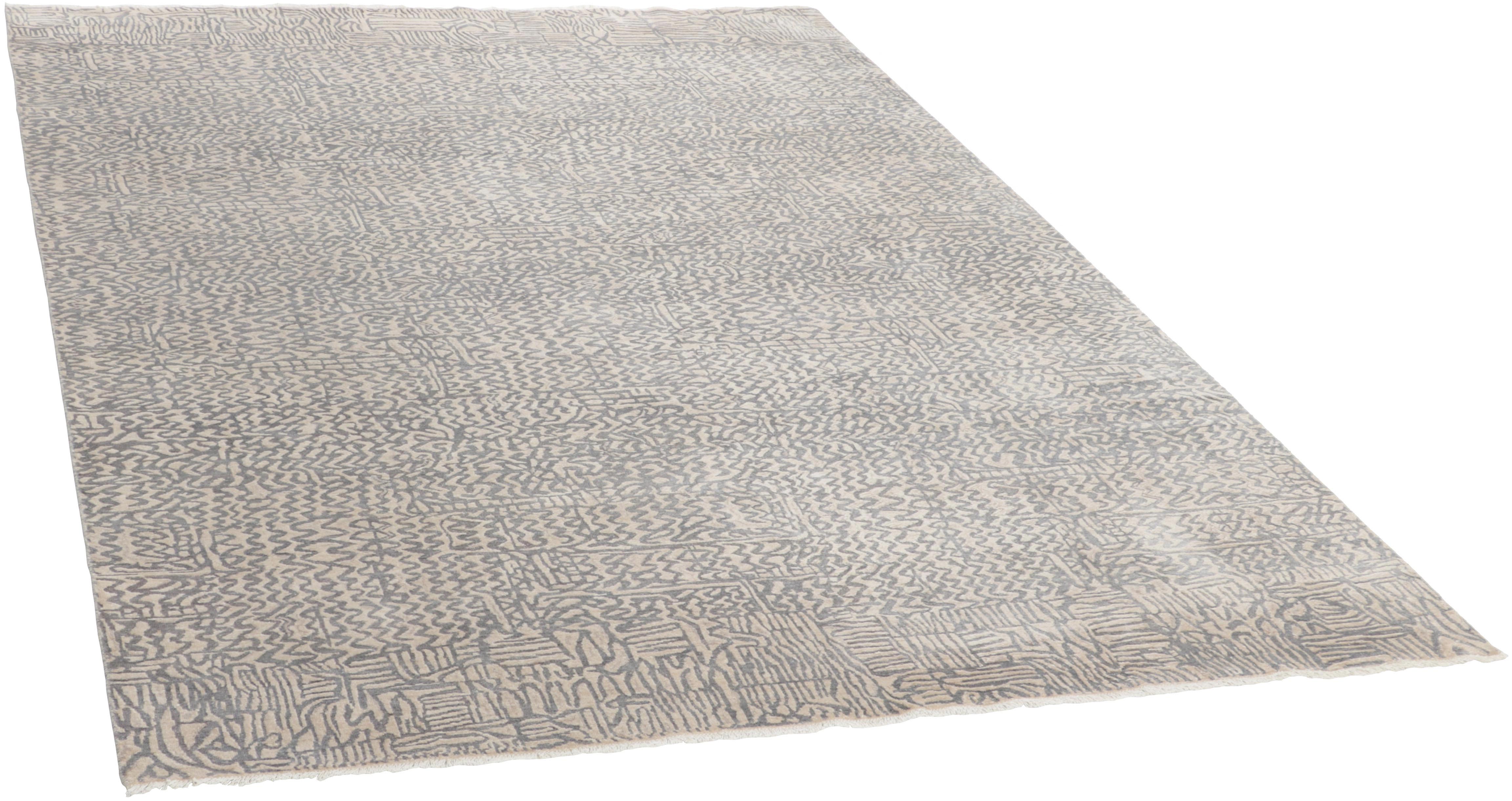 Authentic oriental rug with a damask pattern in beige
