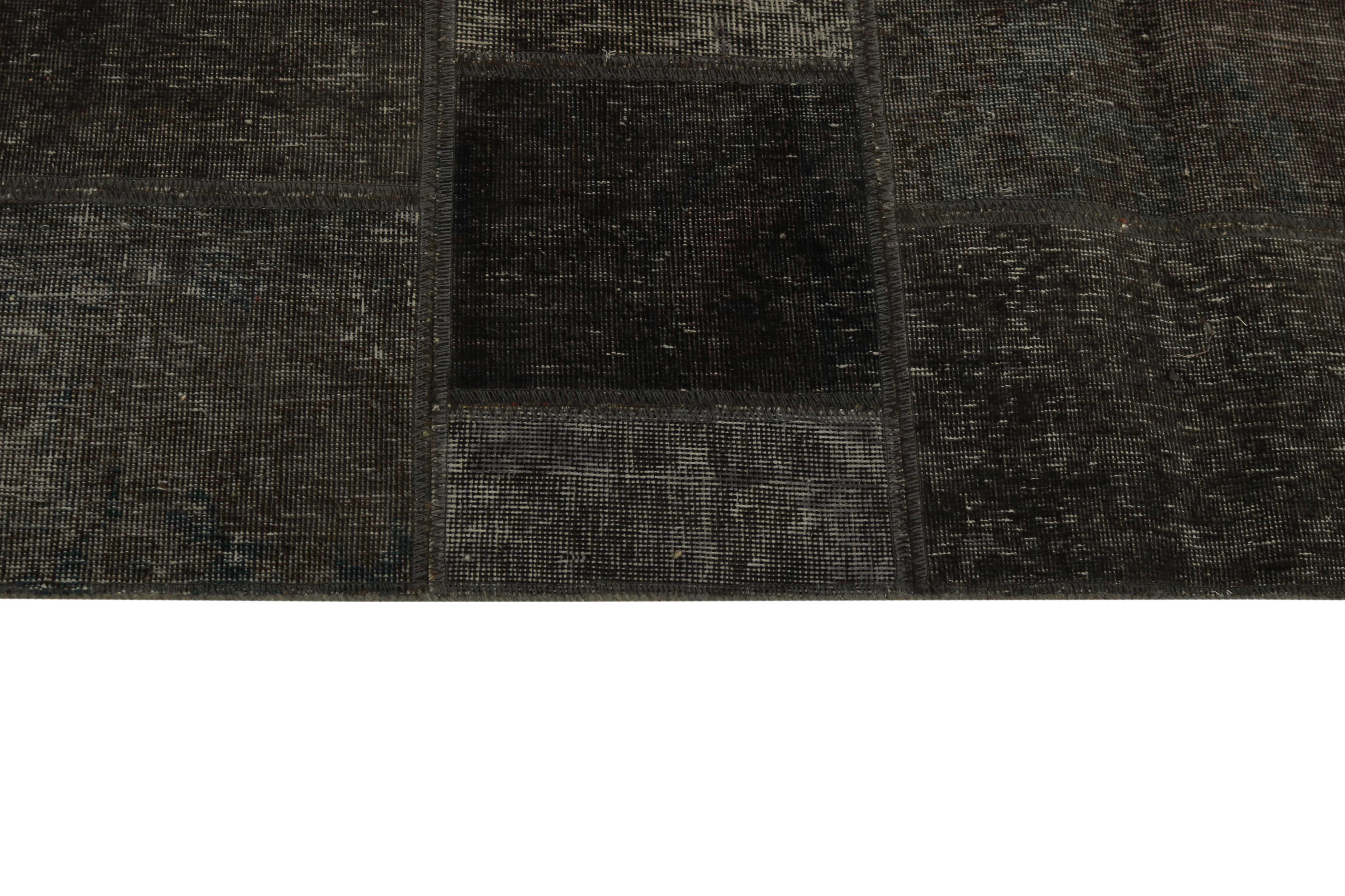 Authentic black patchwork persian rug
