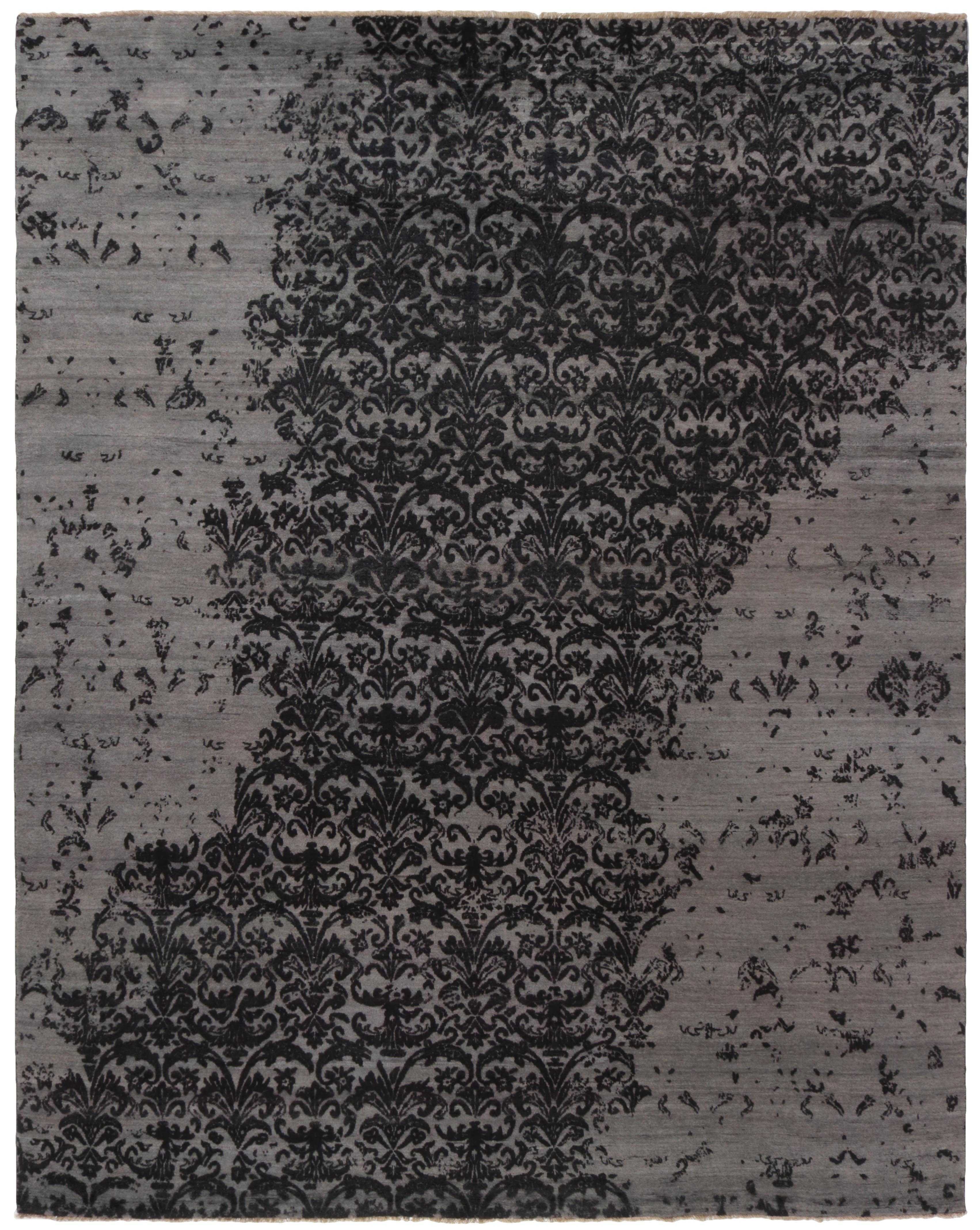 Authentic oriental rug with a damask pattern in grey