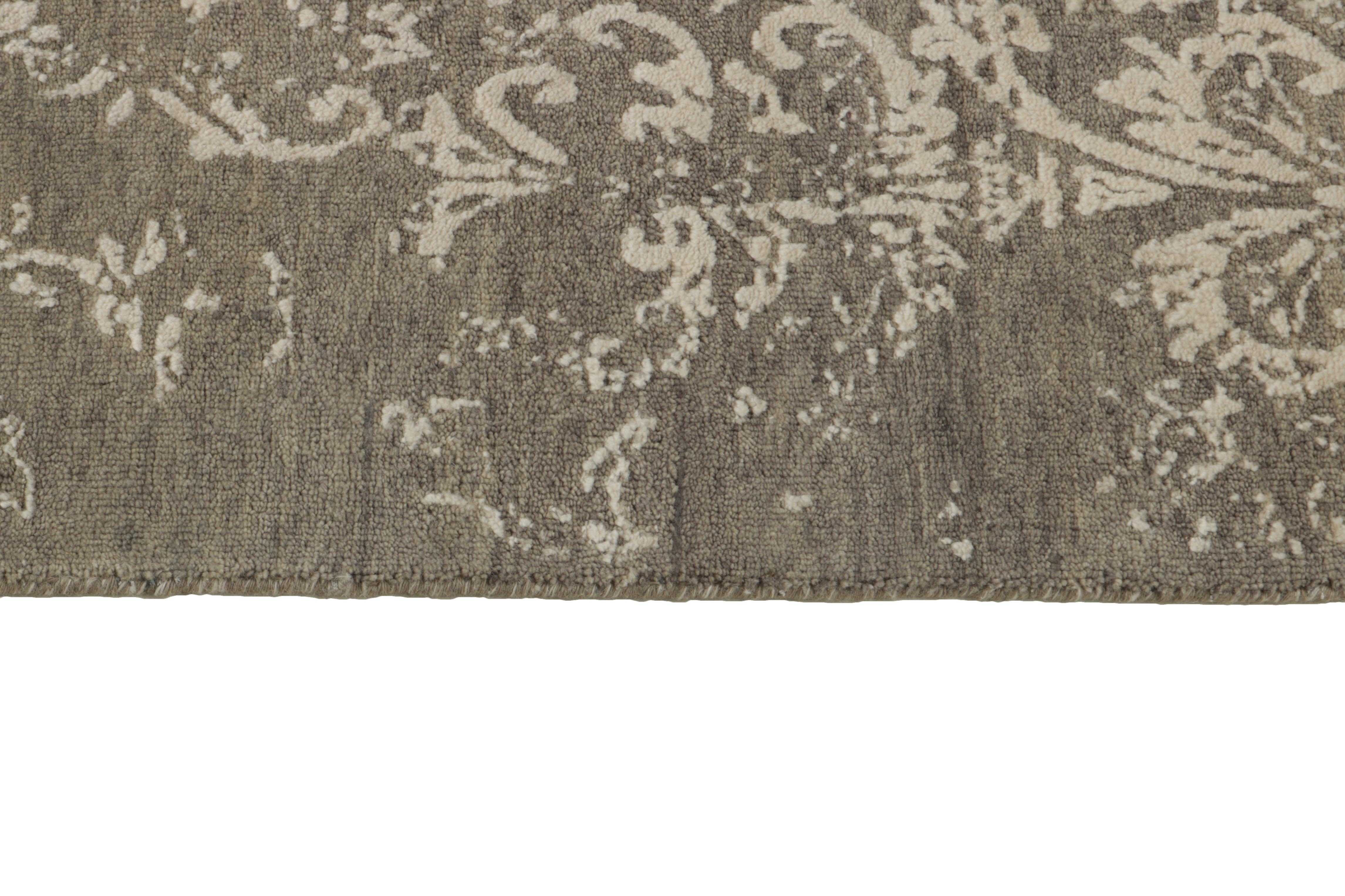 Authentic oriental rug with a damask pattern in beige