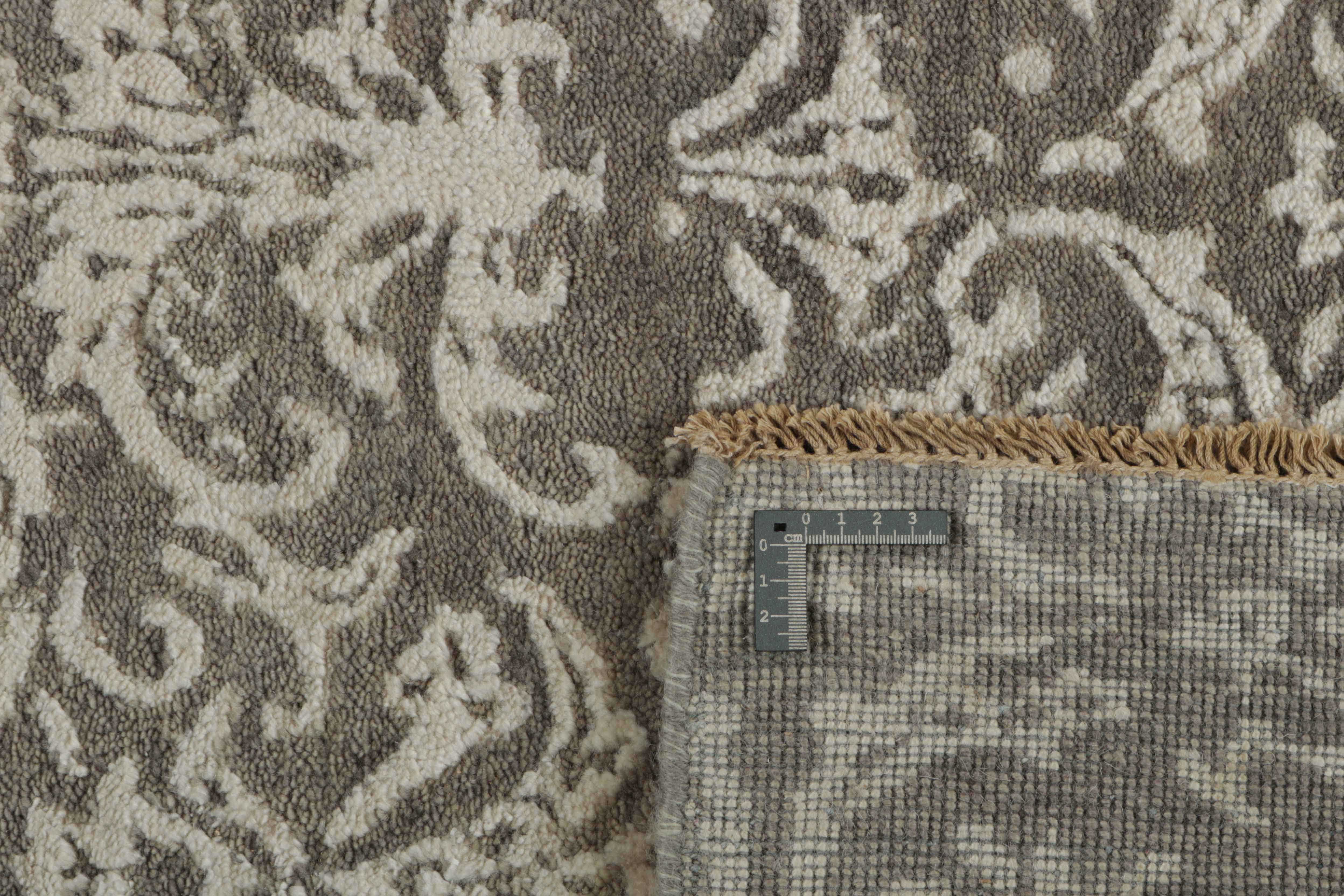 oriental rug with a beige damask pattern