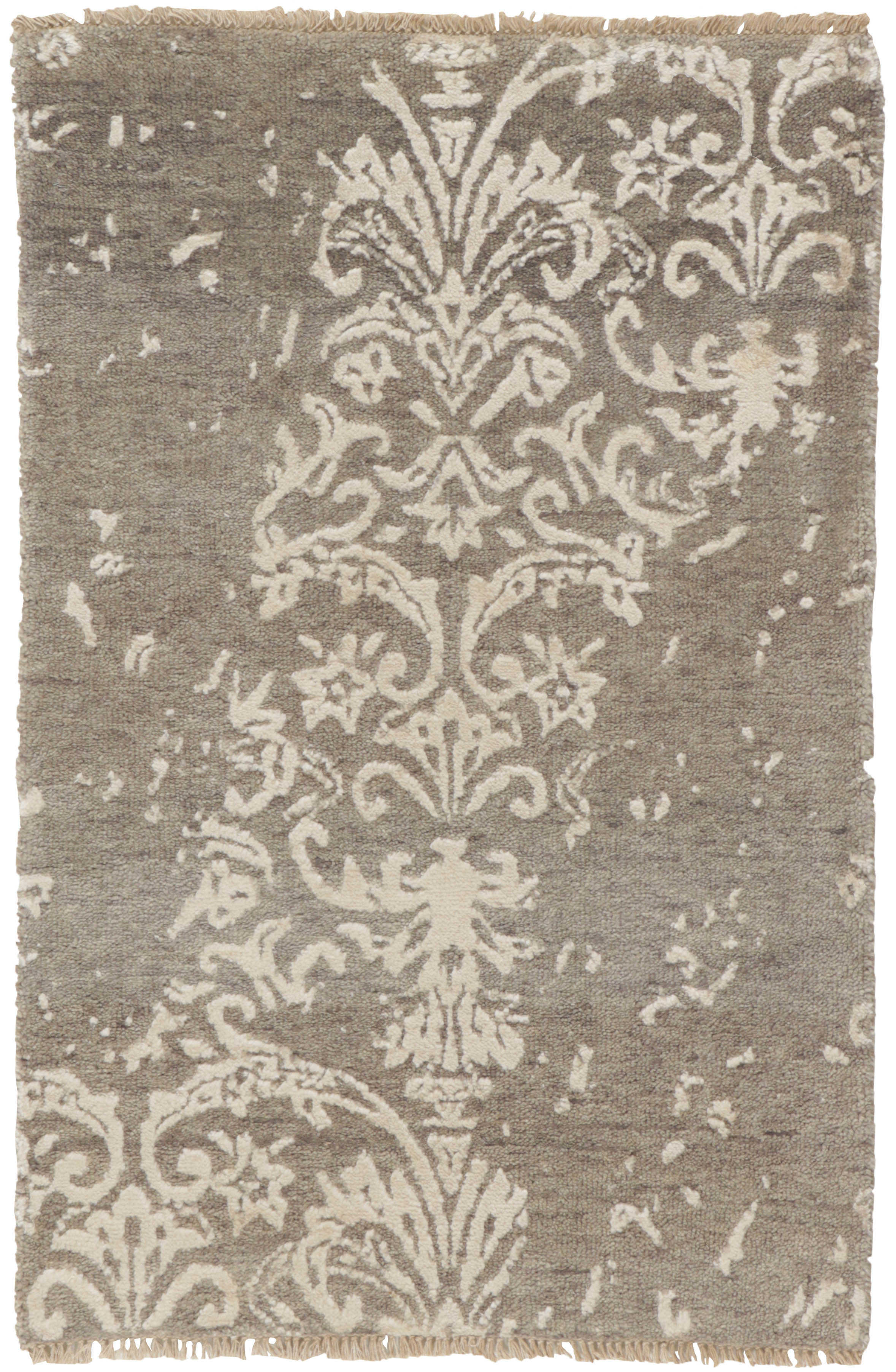 Authentic oriental rug with a damask pattern in beige and ivory