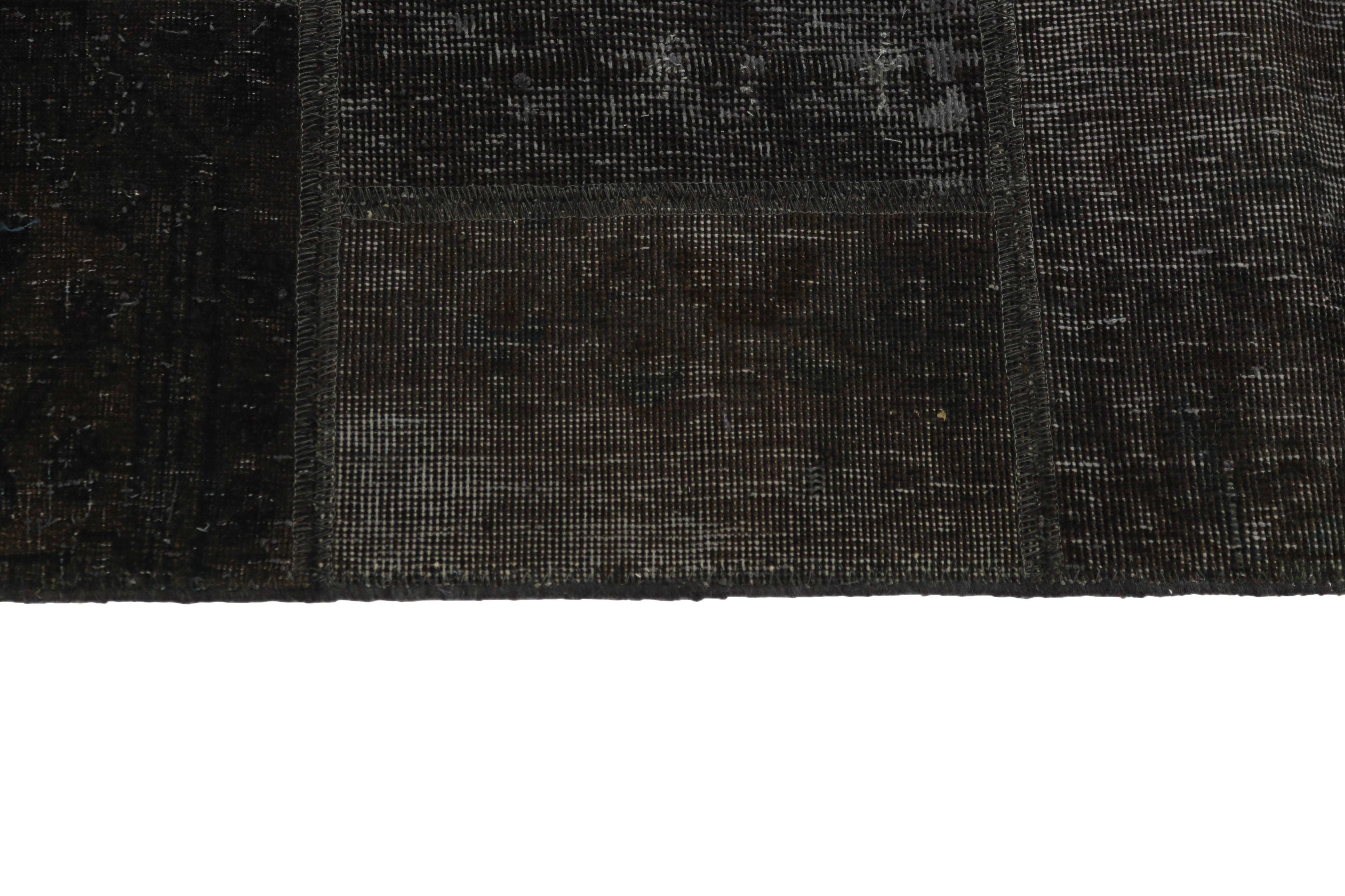Authentic black patchwork persian rug