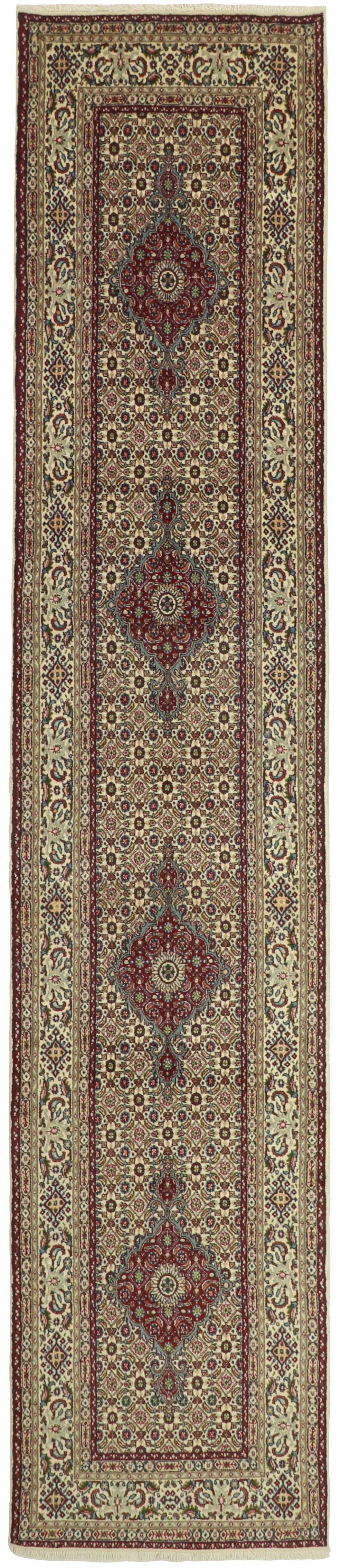authentic persian runner with traditional floral pattern in red, blue and beige