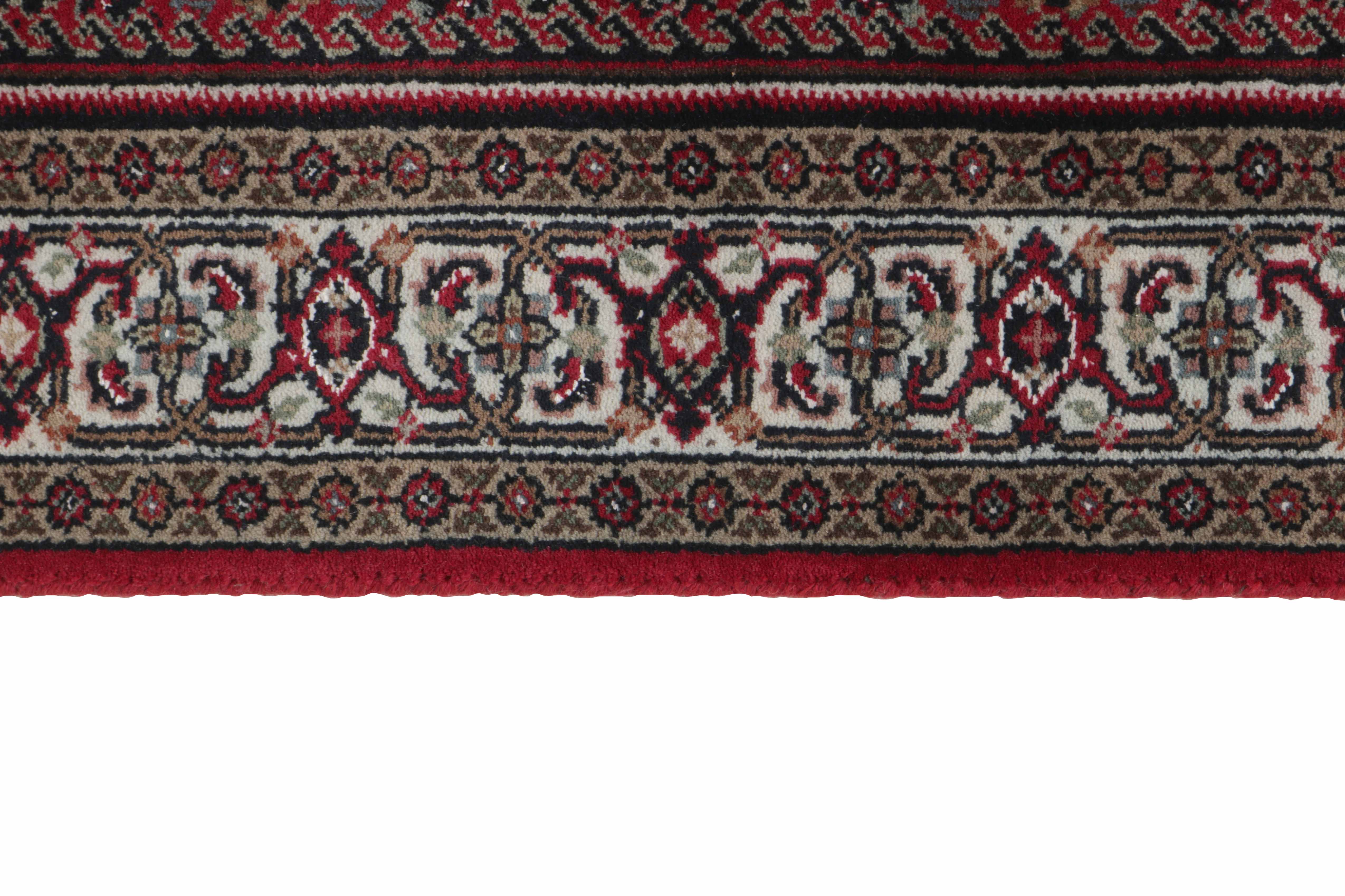 Authentic oriental rug with central medallion and traditional motifs in red