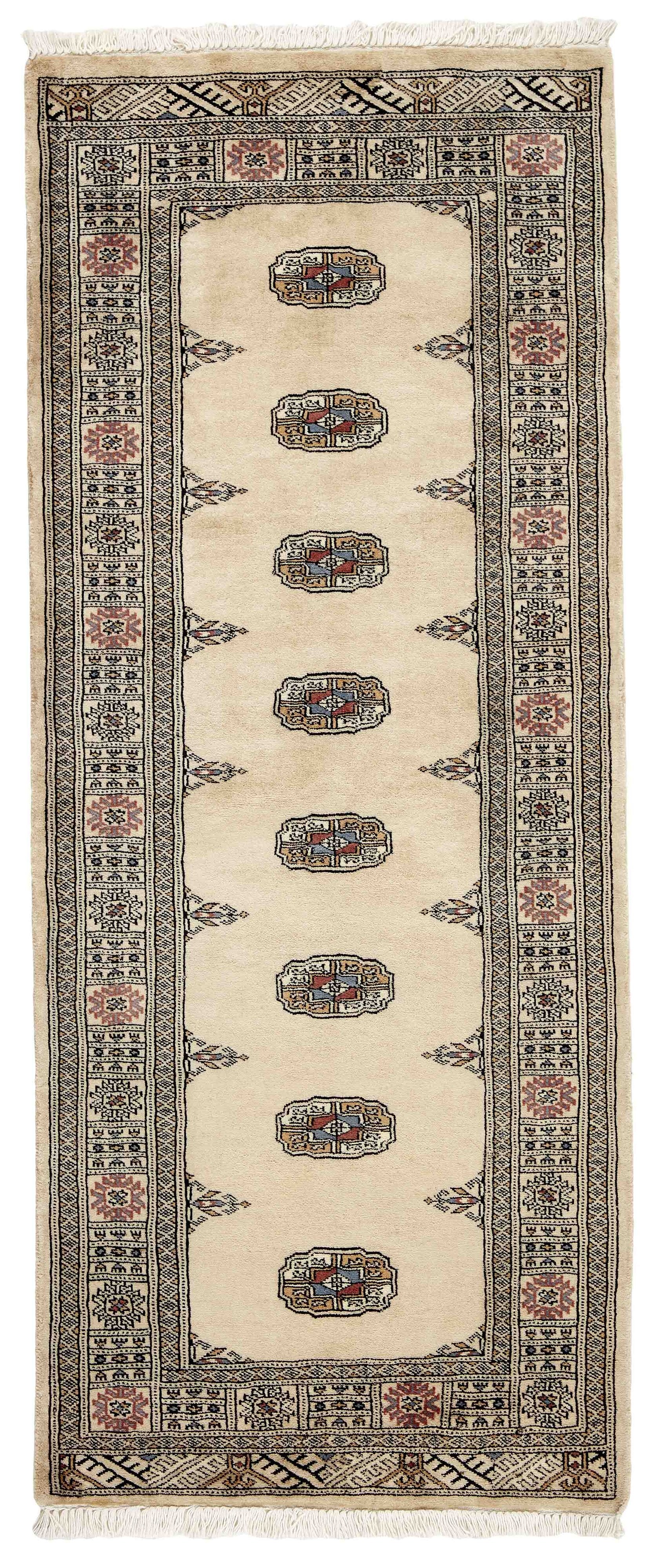 Beige Oriental runner with traditional bordered pattern