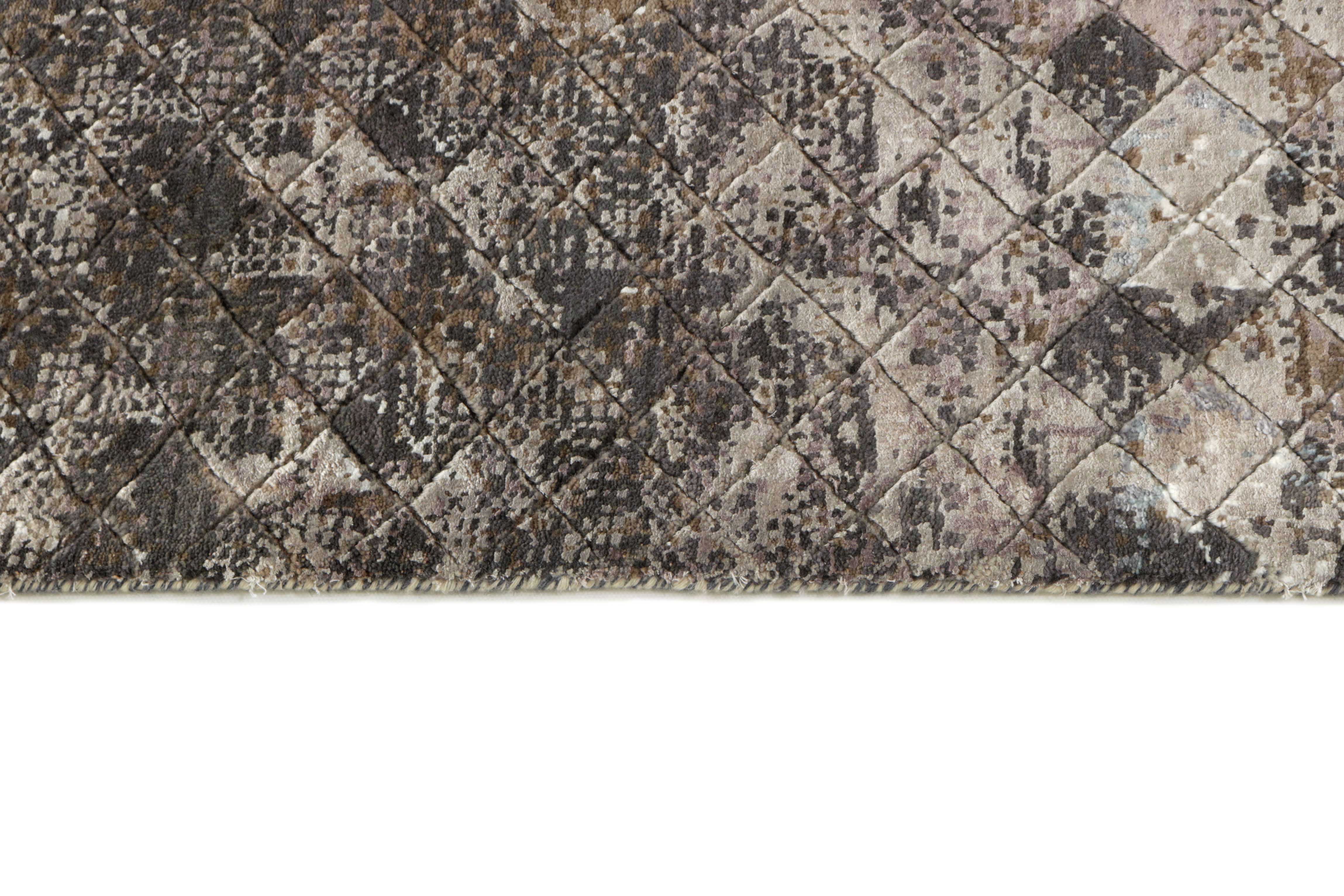 Large area rug with abstract floral design in grey and beige