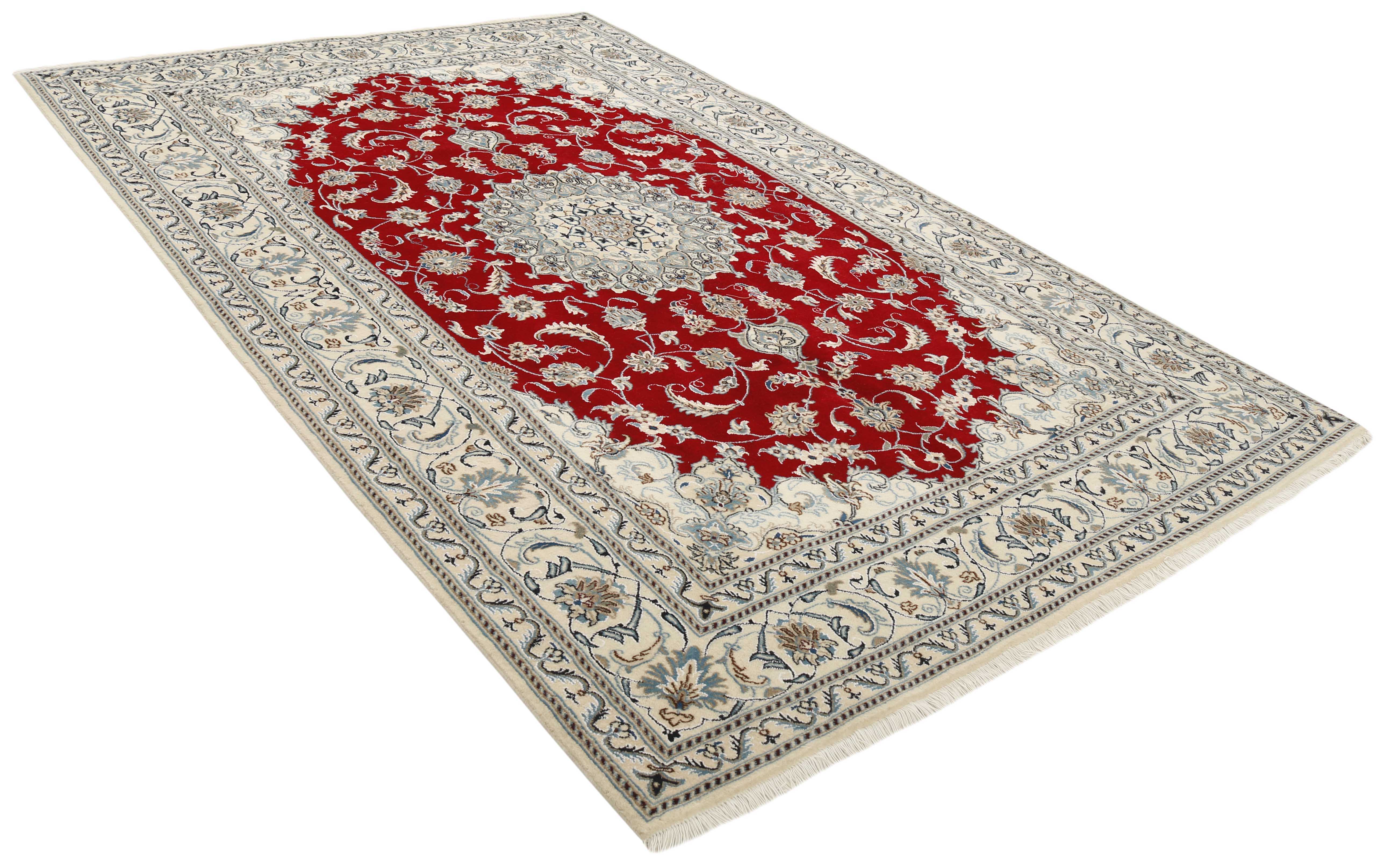 Authentic persian rug with a traditional floral design in cream and blue