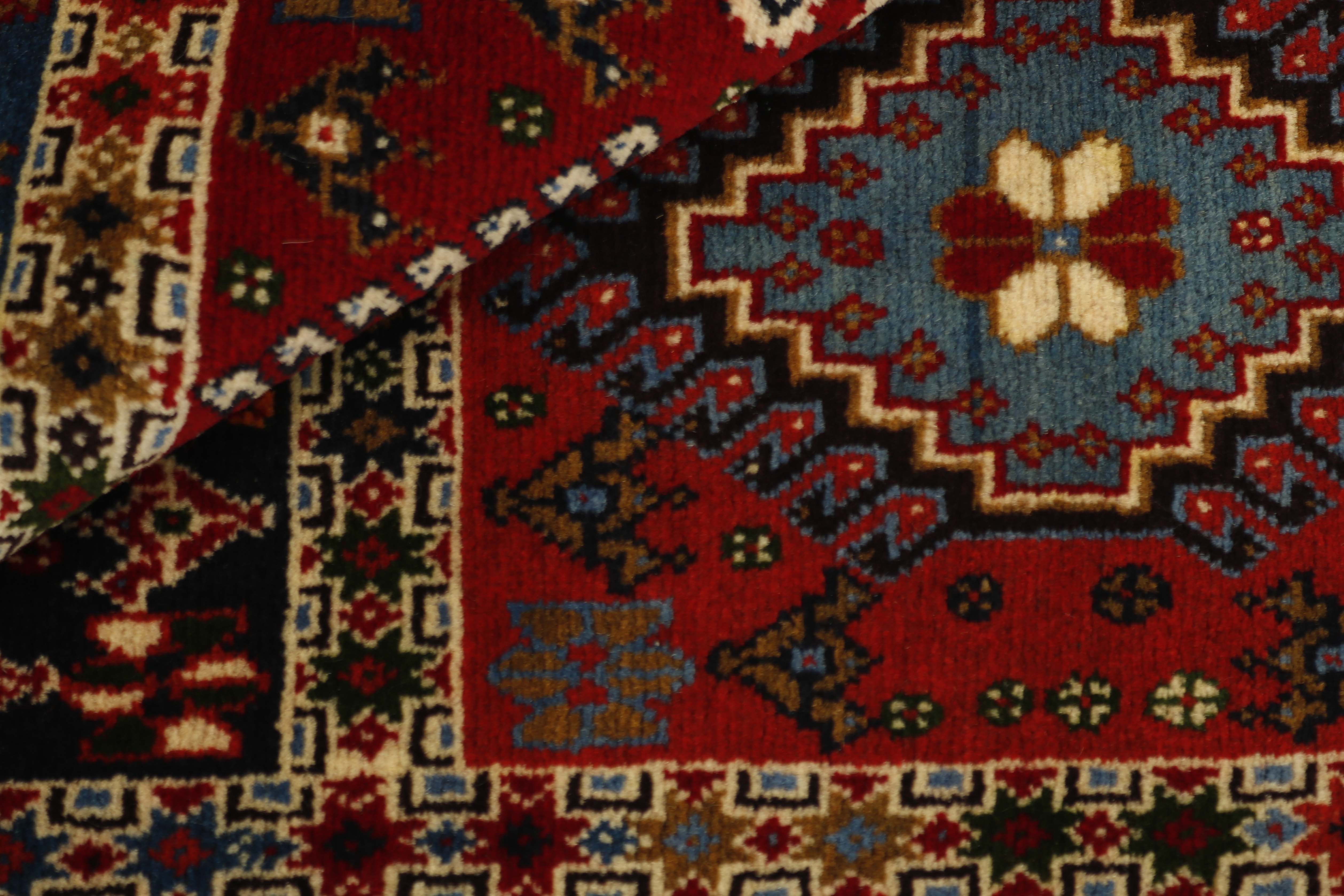 red authentic persian rug with a traditional design