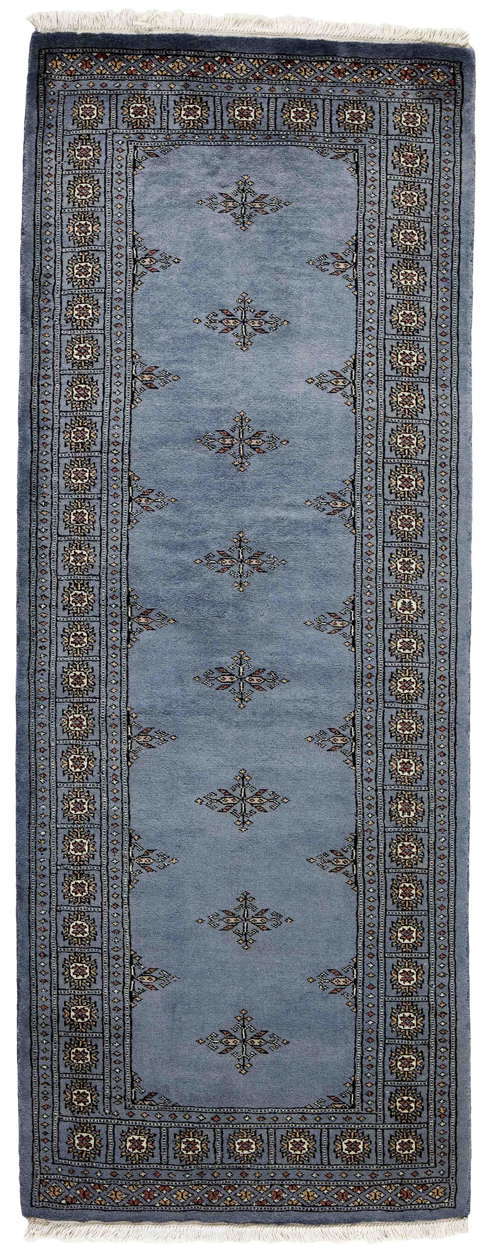 Blue Oriental runner with traditional bordered pattern
