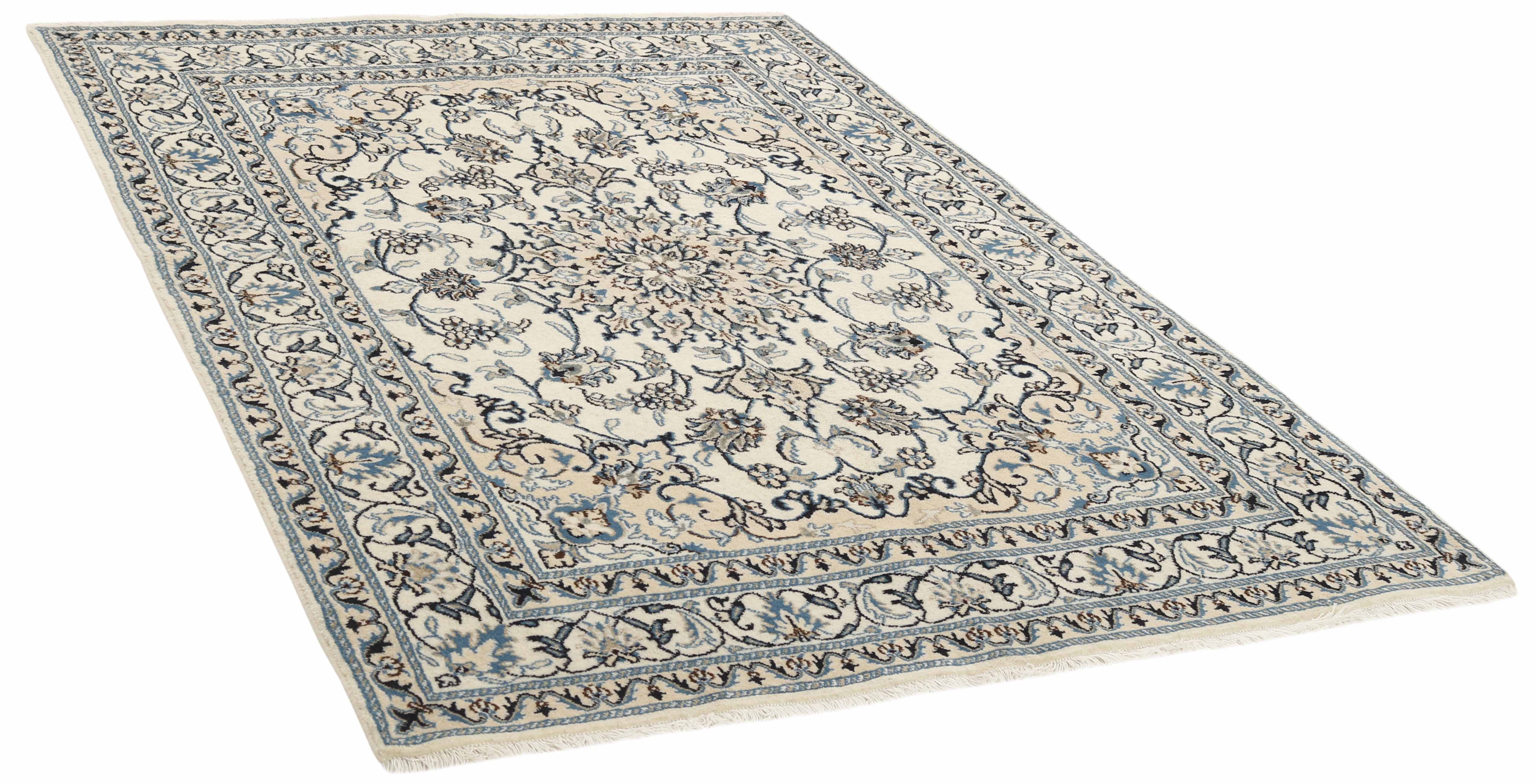 Authentic persian rug with a traditional floral design in cream and blue