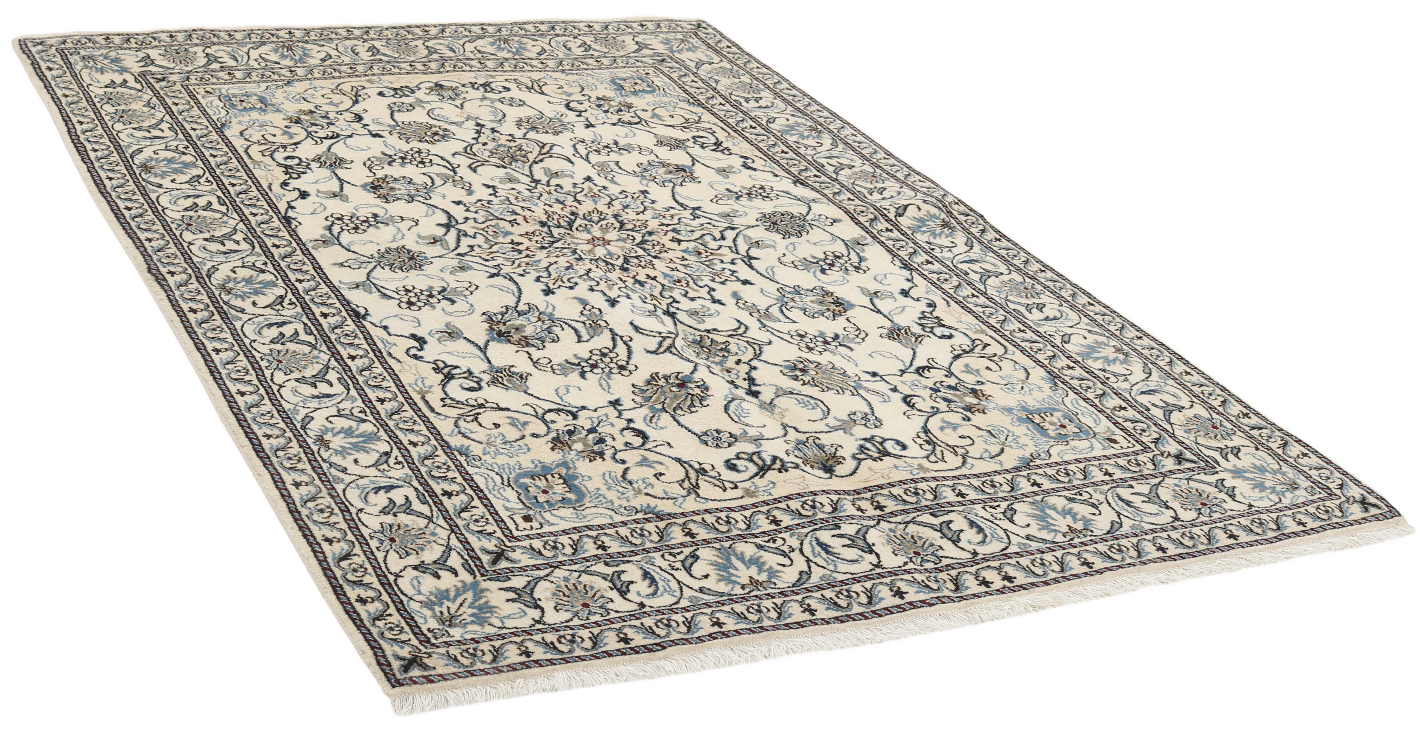 Authentic persian rug with a traditional floral design in cream and blue