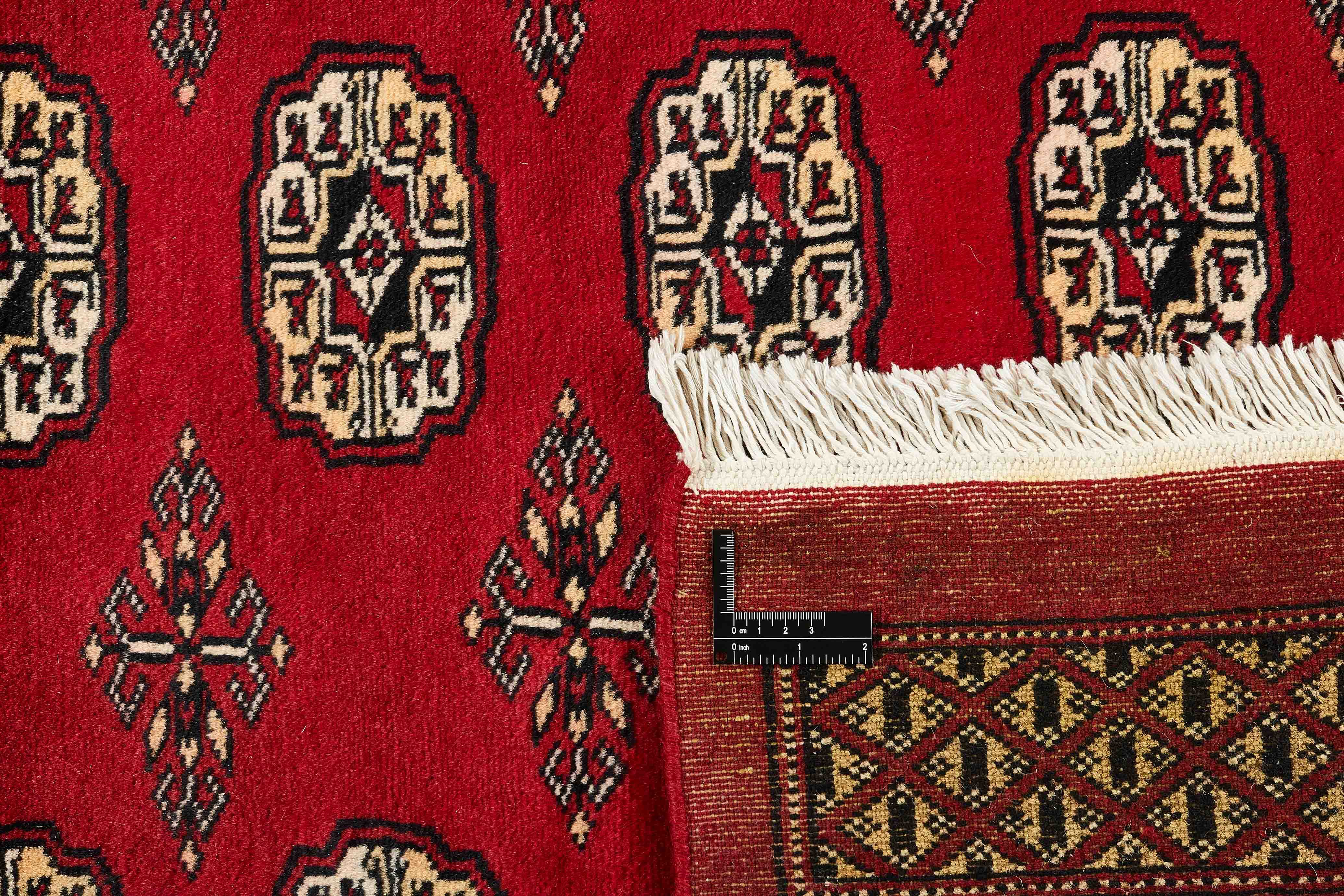 red oriental rug with traditional pattern