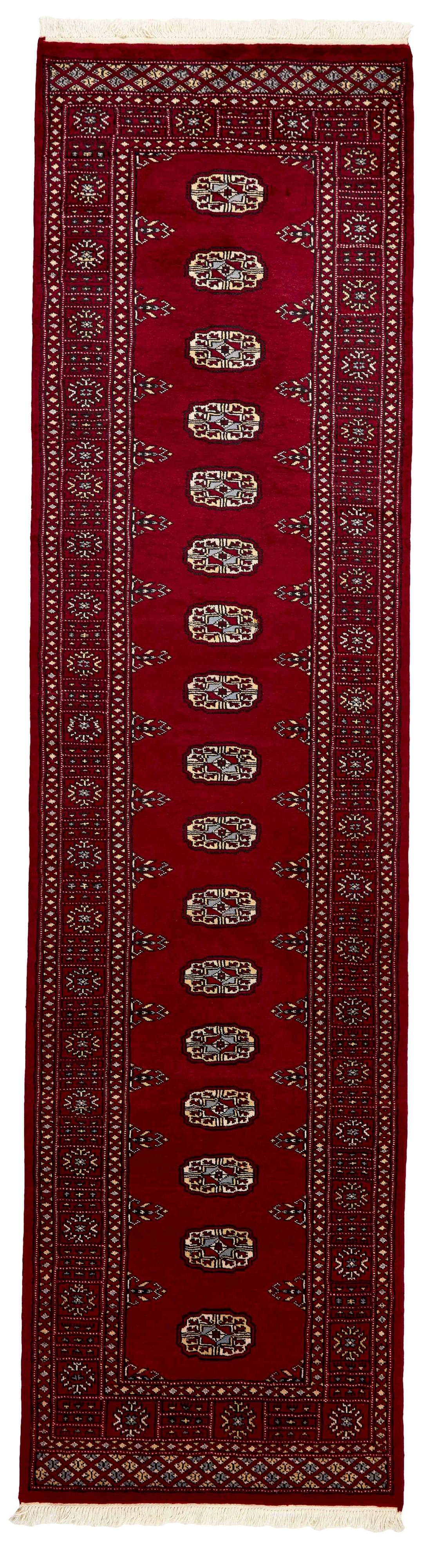 red oriental runner with traditional gul pattern