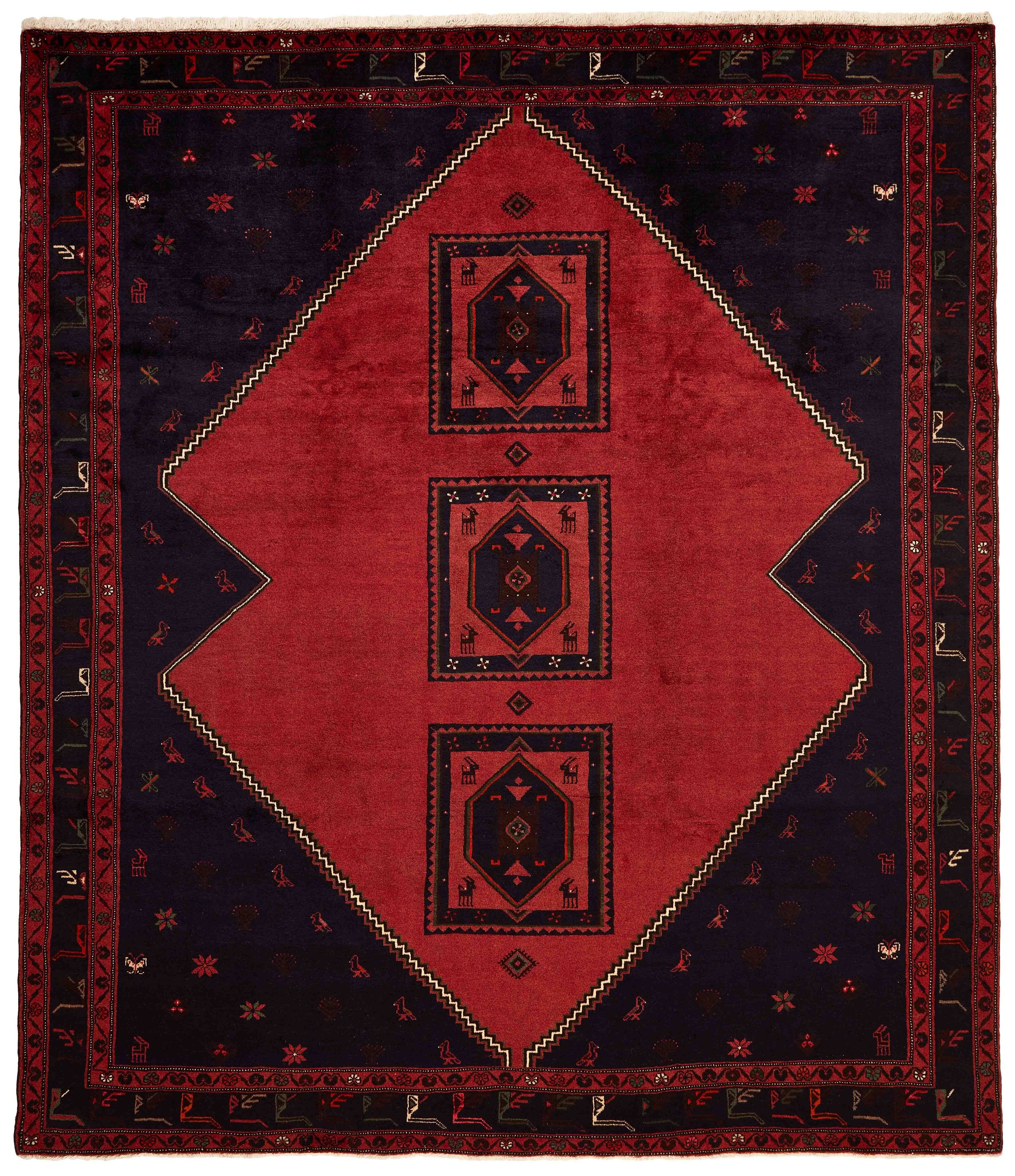 Authentic persian rug with a traditional geometric pattern in red